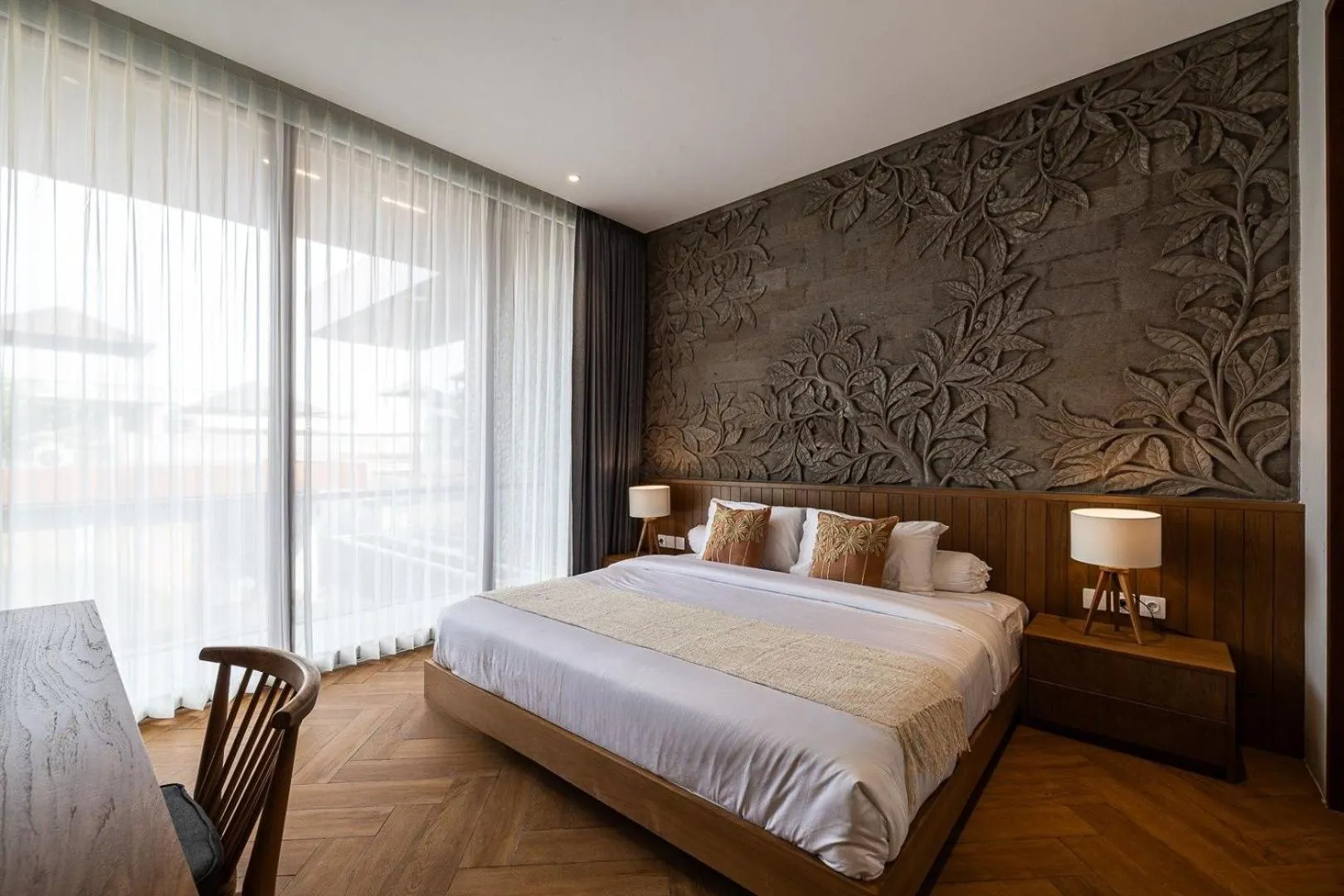 Bed in AMR Echo Beach Villa's Canggu