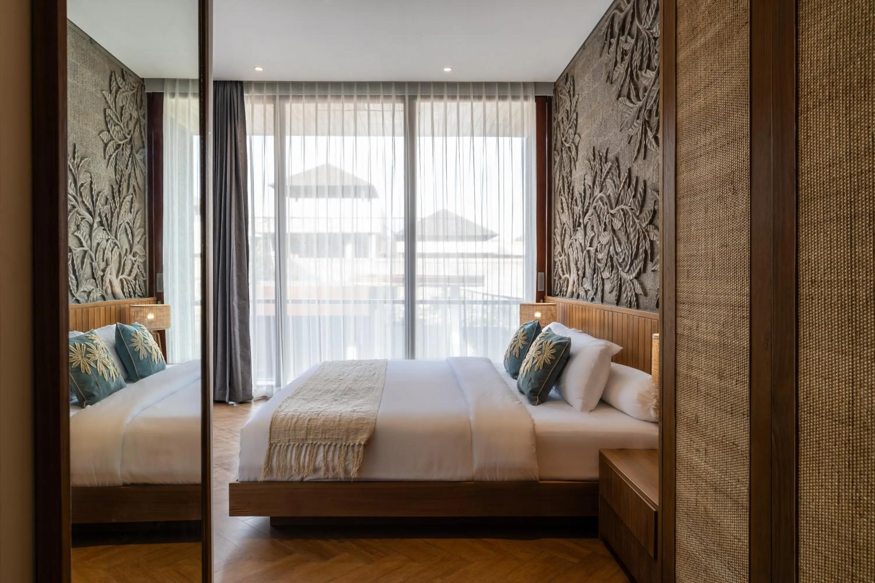 Bed in AMR Echo Beach Villa's Canggu