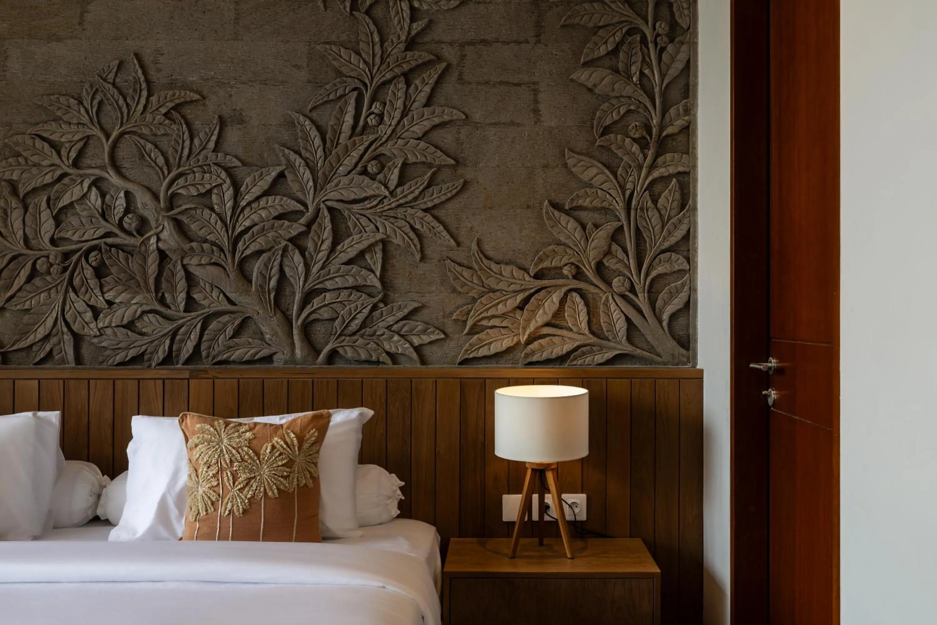 Bed in AMR Echo Beach Villa's Canggu