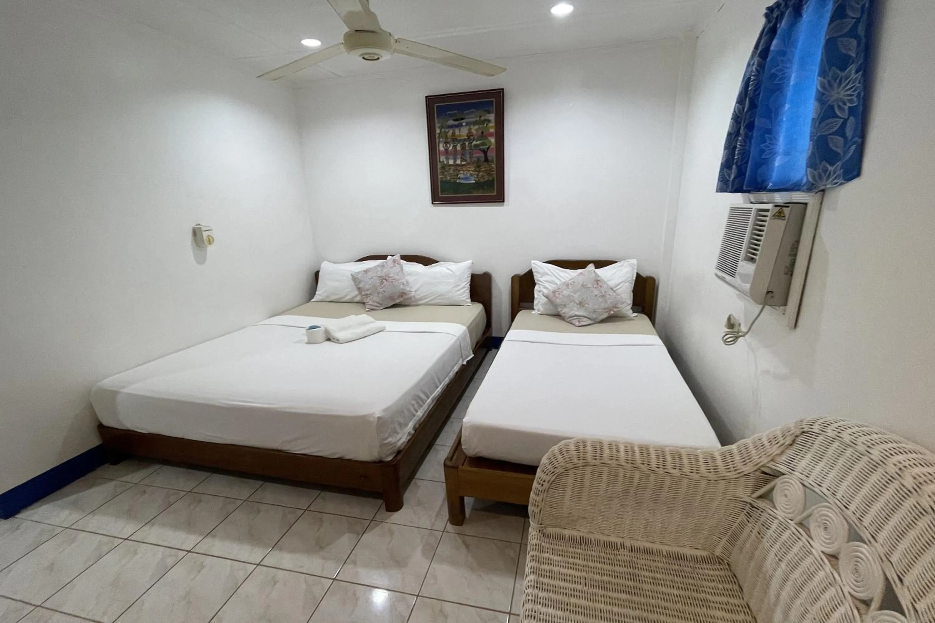 Photo of the whole room, Bed in Casa de Praxides Tourist Inn Palawan