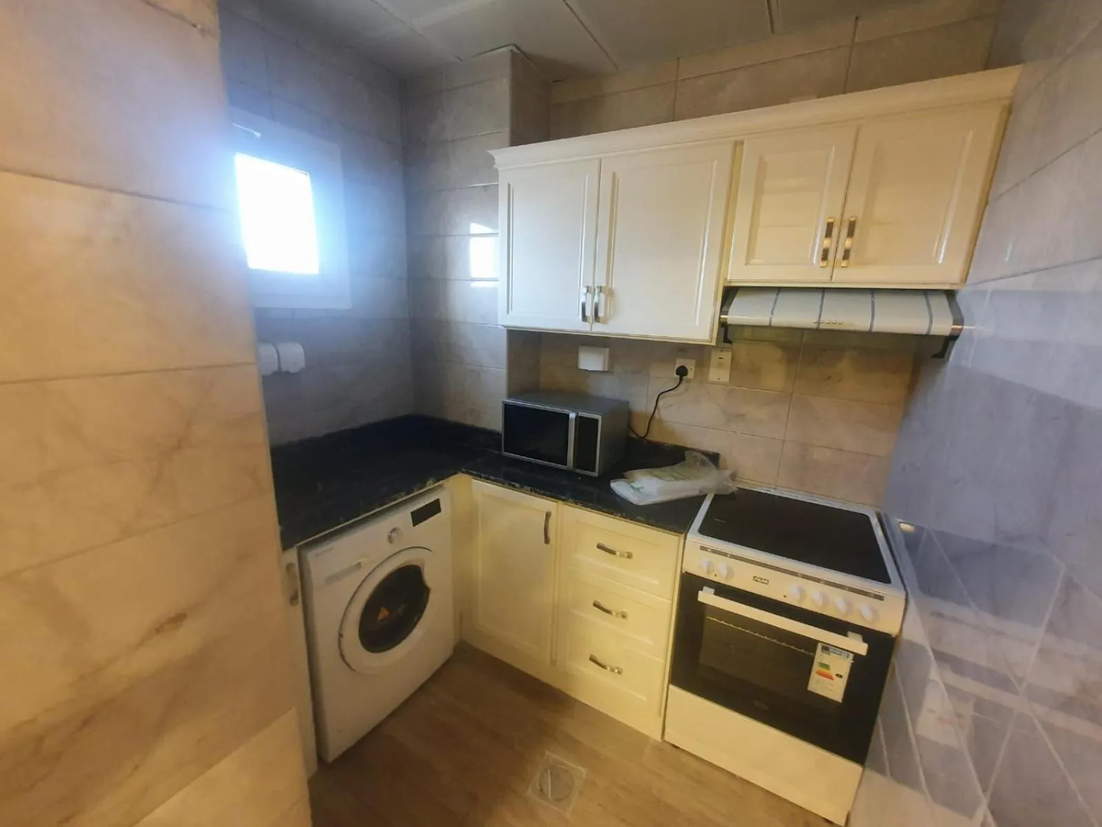 Kitchen or kitchenette in Terminal Inn Fully Furnished Hotel & Apartment- Old Airport