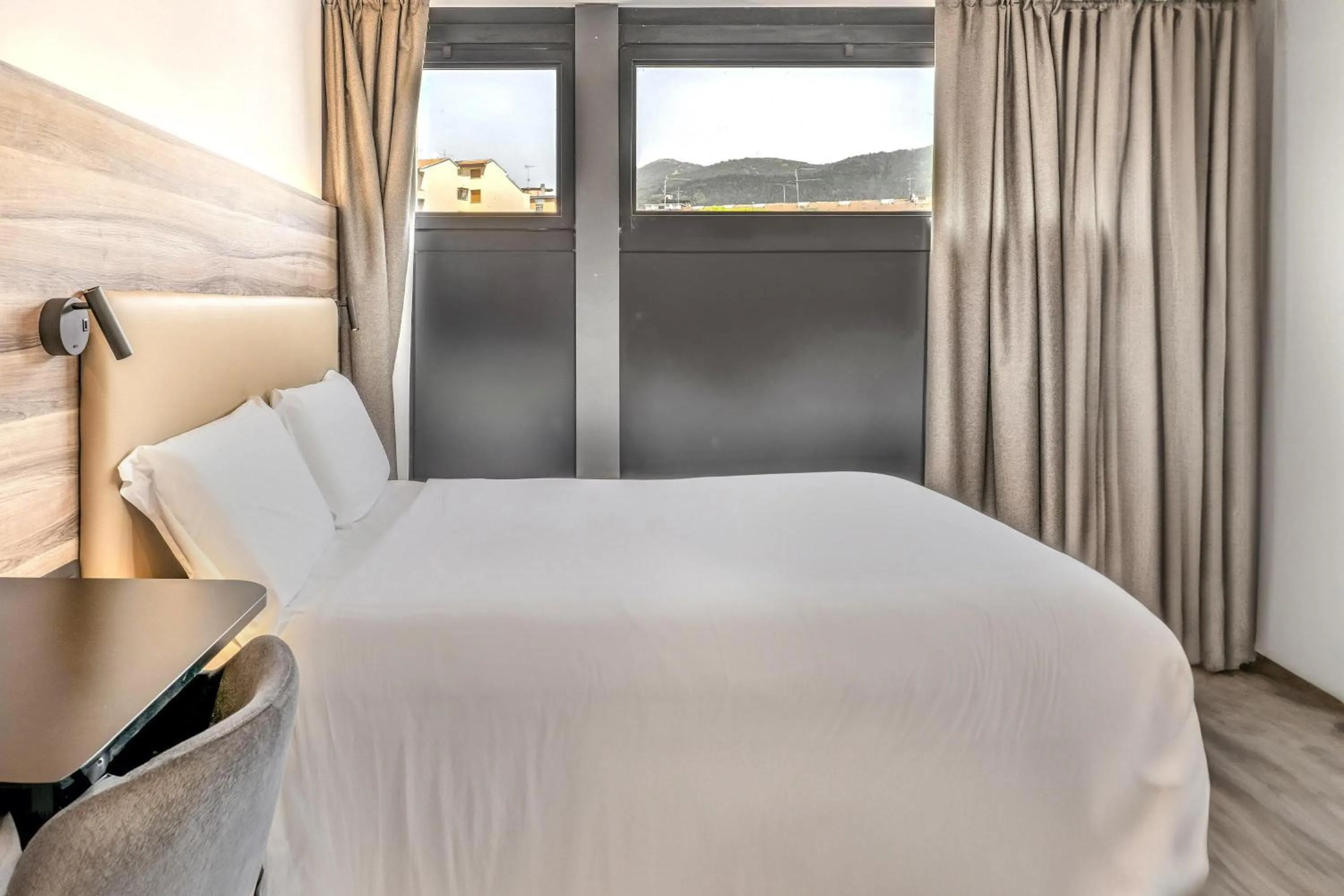 Photo of the whole room, Bed in B&B HOTEL Prato City Center