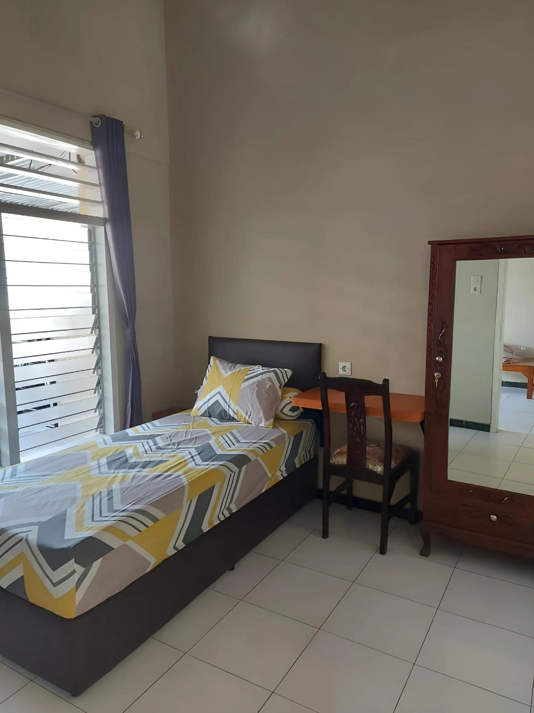 Bed in Penginapan PIP Semarang