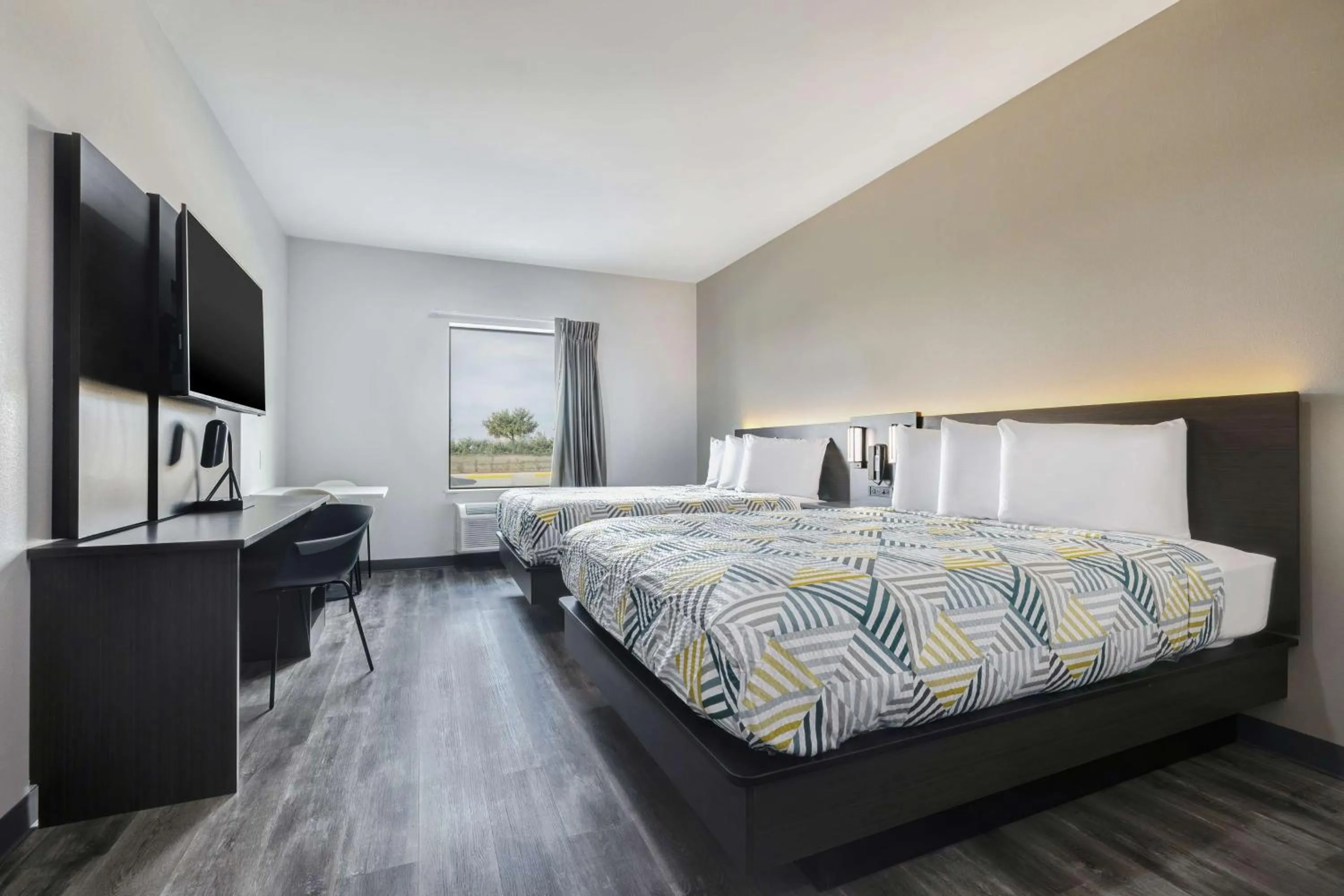 Bathroom, Bed in Studio 6 Katy, TX Energy Corridor