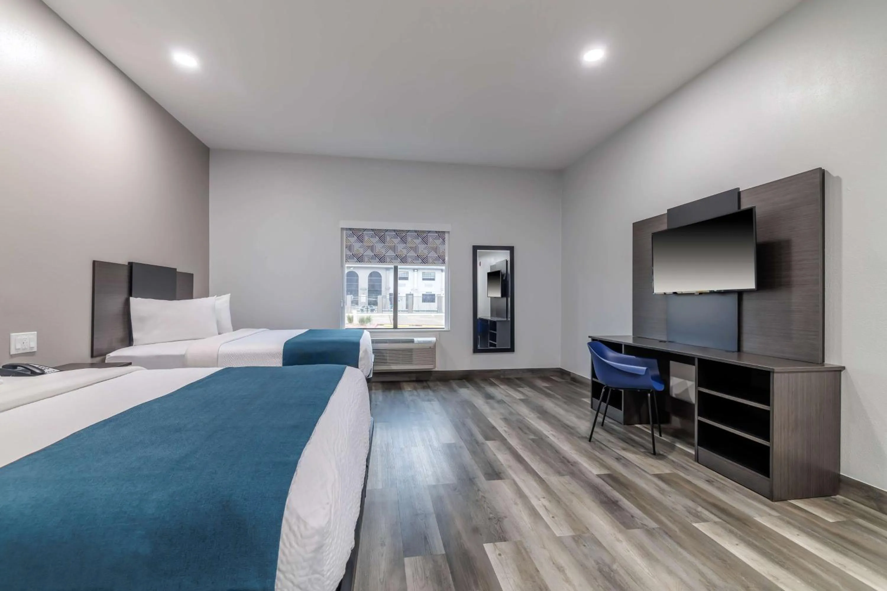 Bedroom, Bed in Studio 6 Suites Brenham, TX