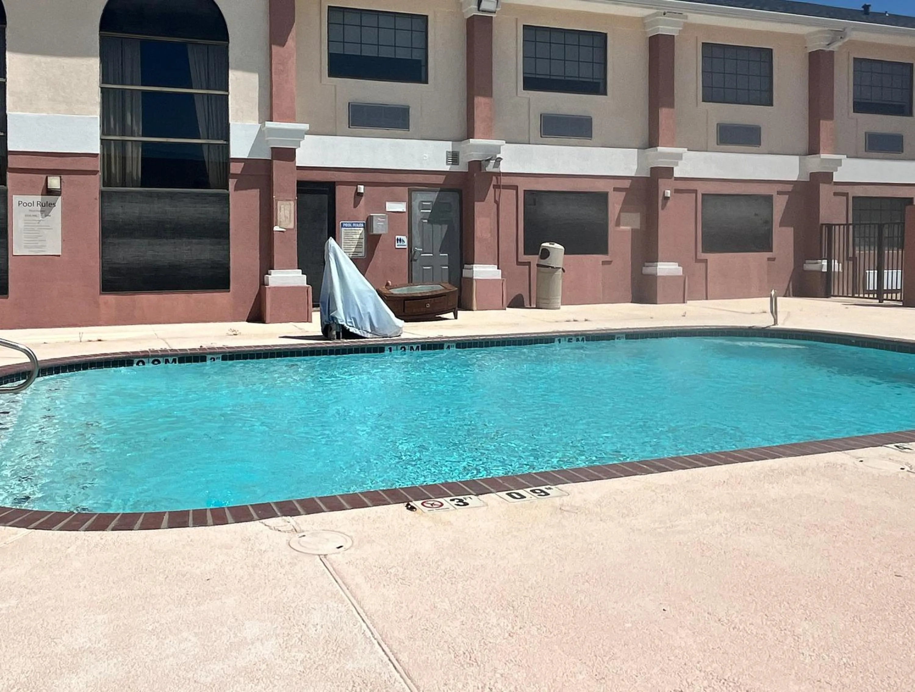 Swimming pool in Studio 6 Suites Brenham, TX