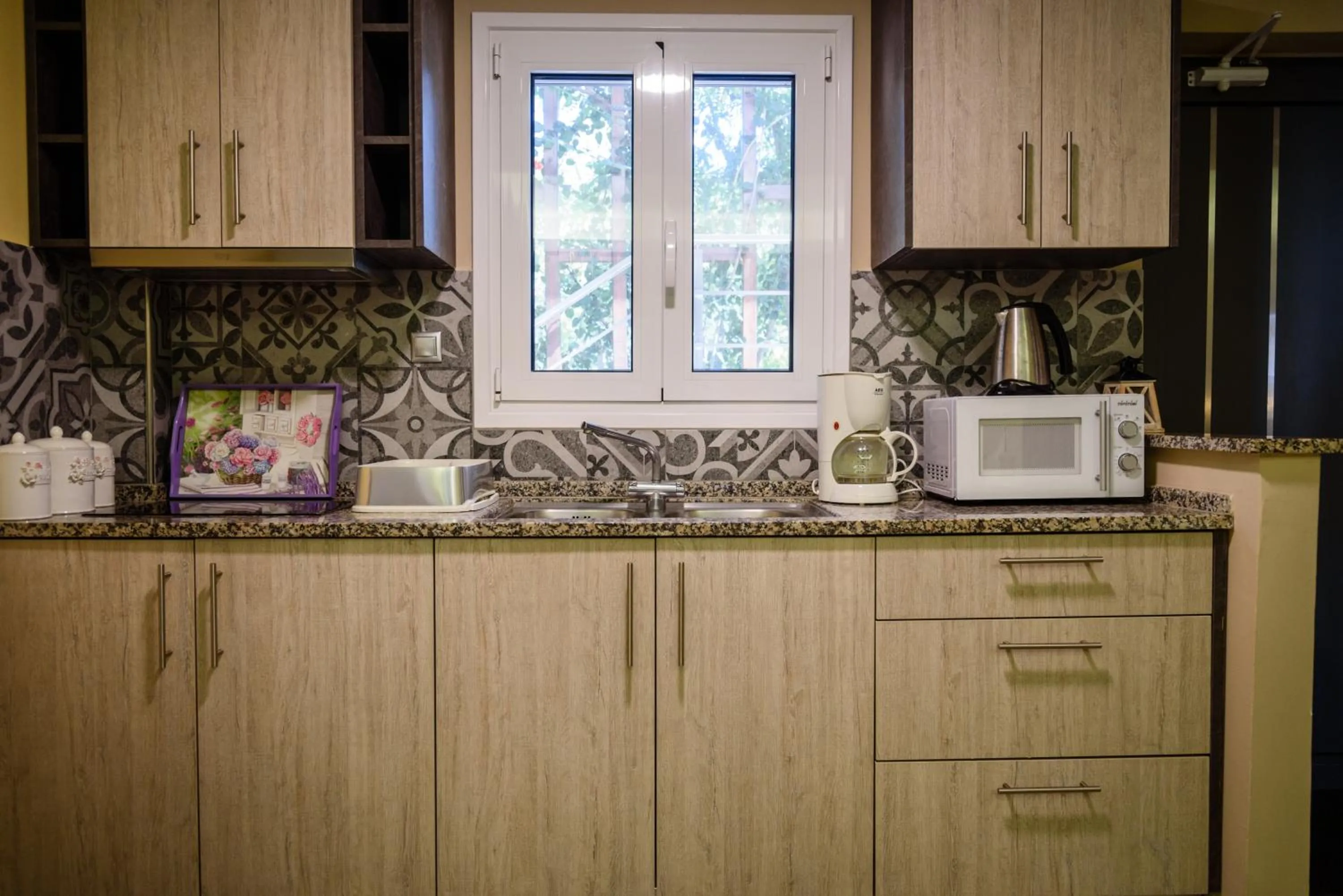 Kitchen or kitchenette in Ionion Beach Apartment Hotel & Spa