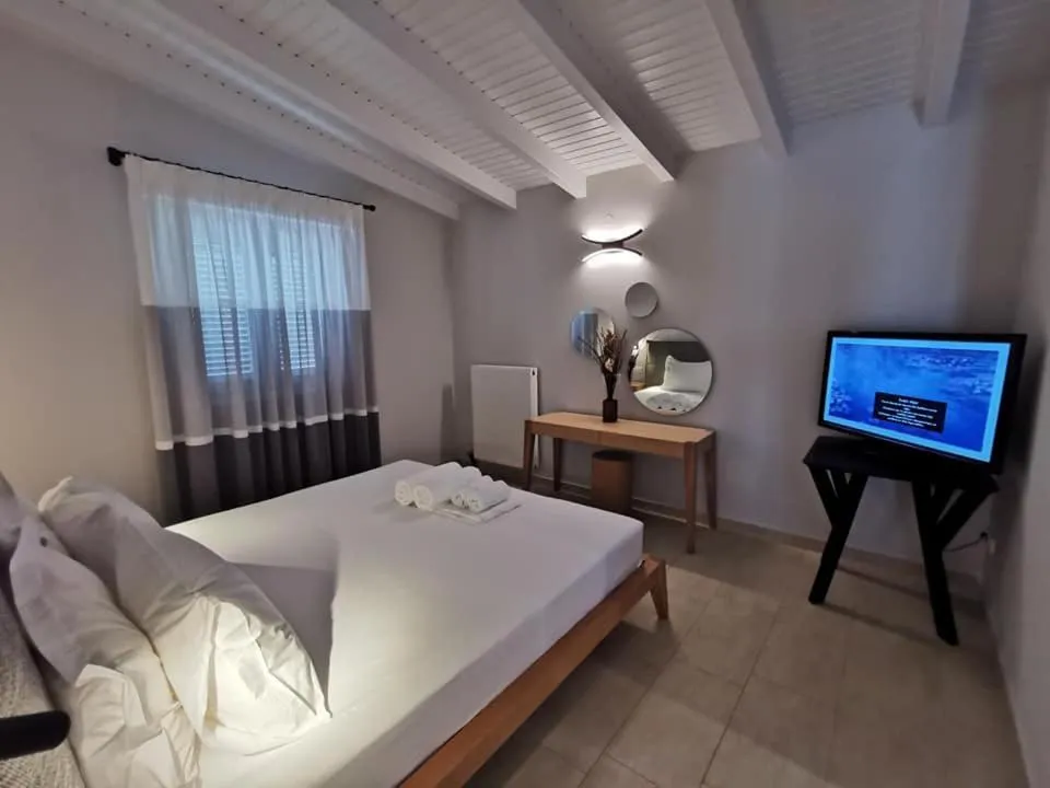Bed in Ionion Beach Apartment Hotel & Spa