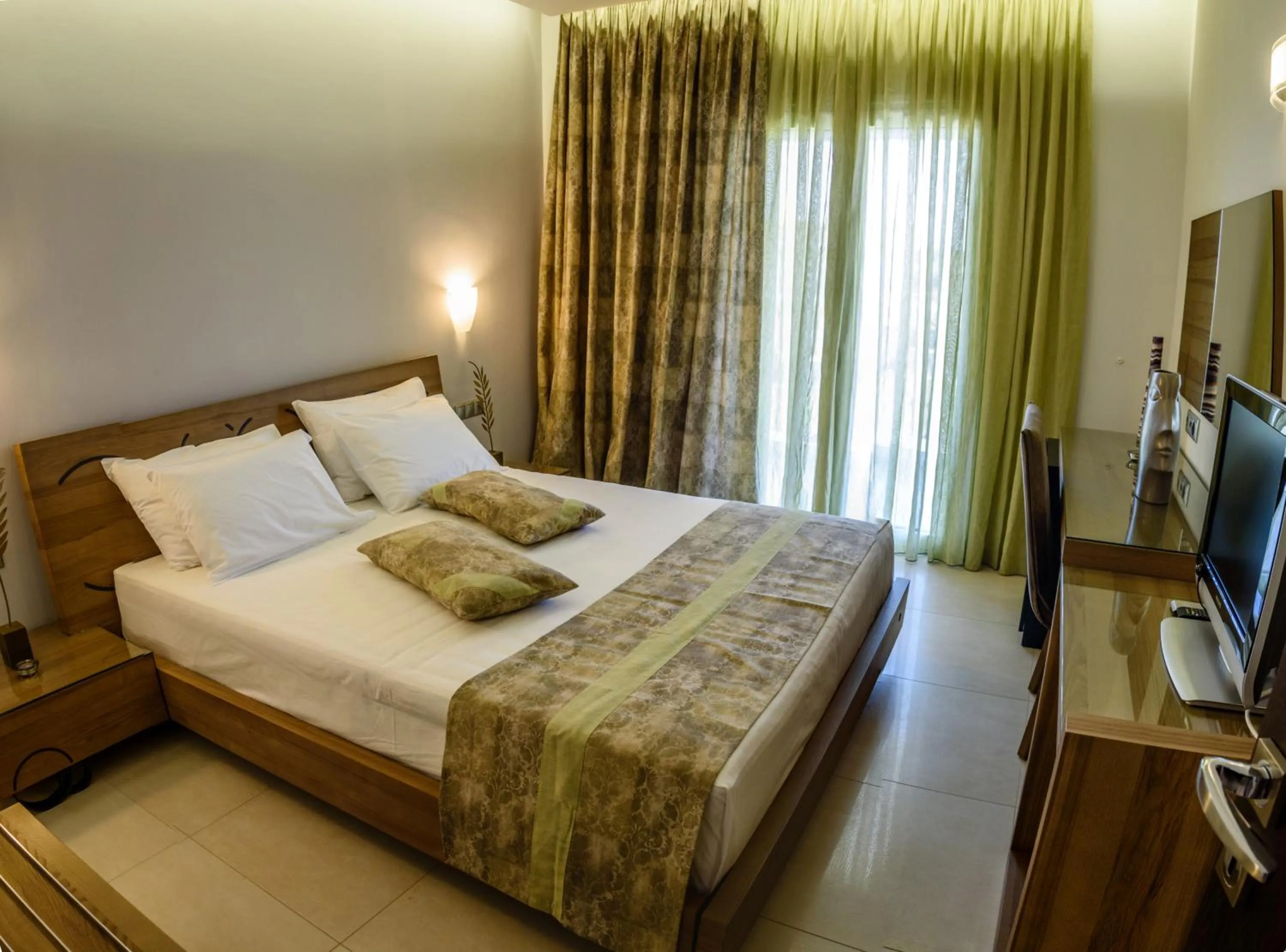 Photo of the whole room, Bed in Ionion Beach Apartment Hotel & Spa