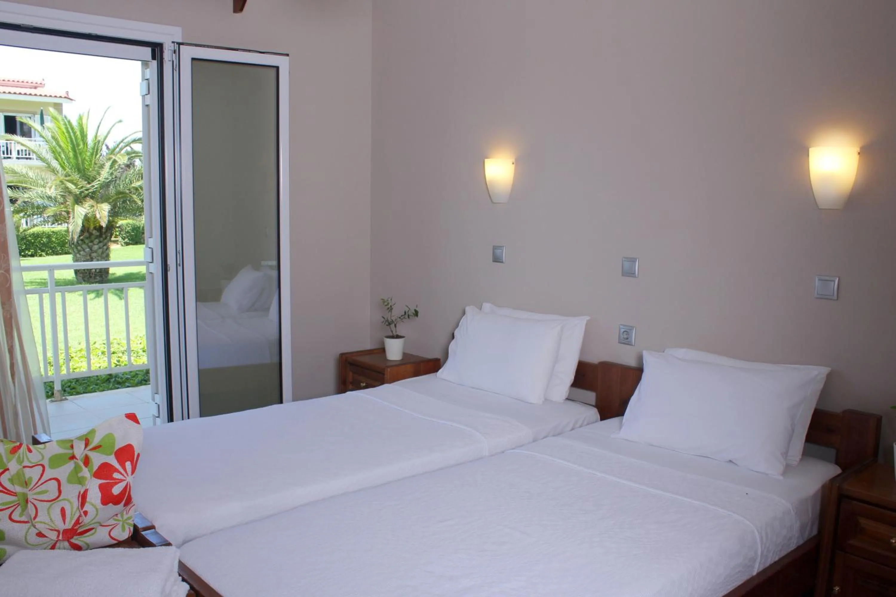 Bed in Ionion Beach Apartment Hotel & Spa