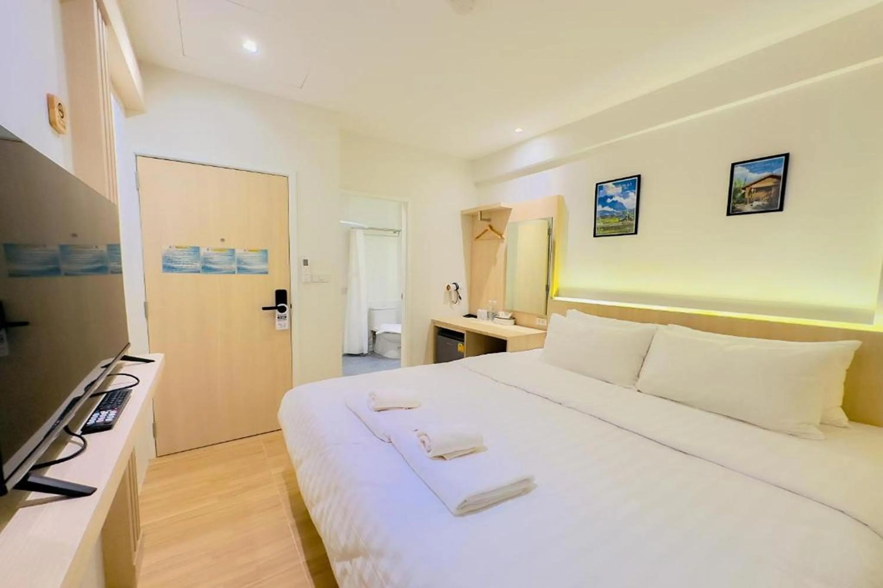 Bed in Zhennan Teabar Hotel