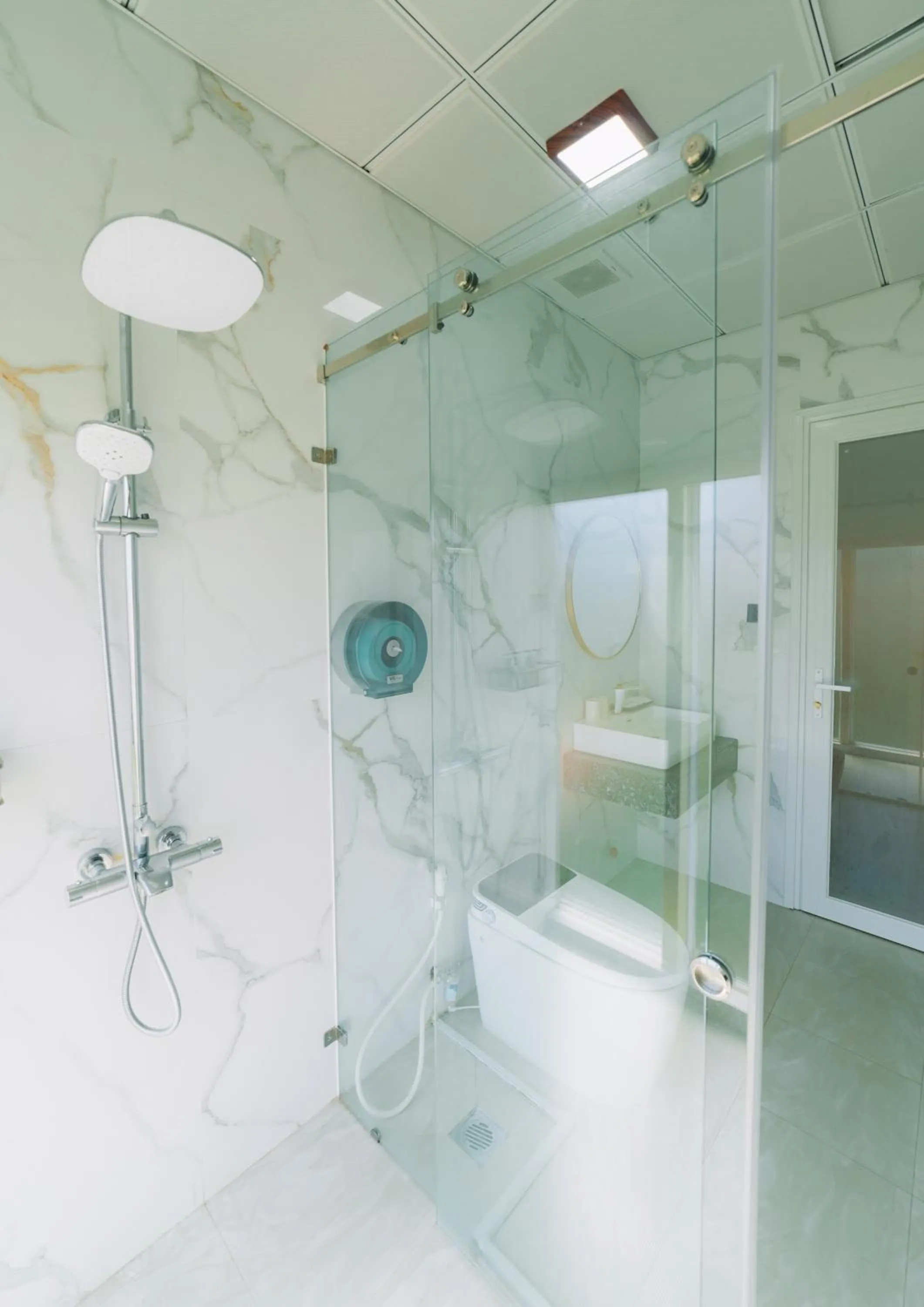 Shower in Quy Tai Premium Hotel