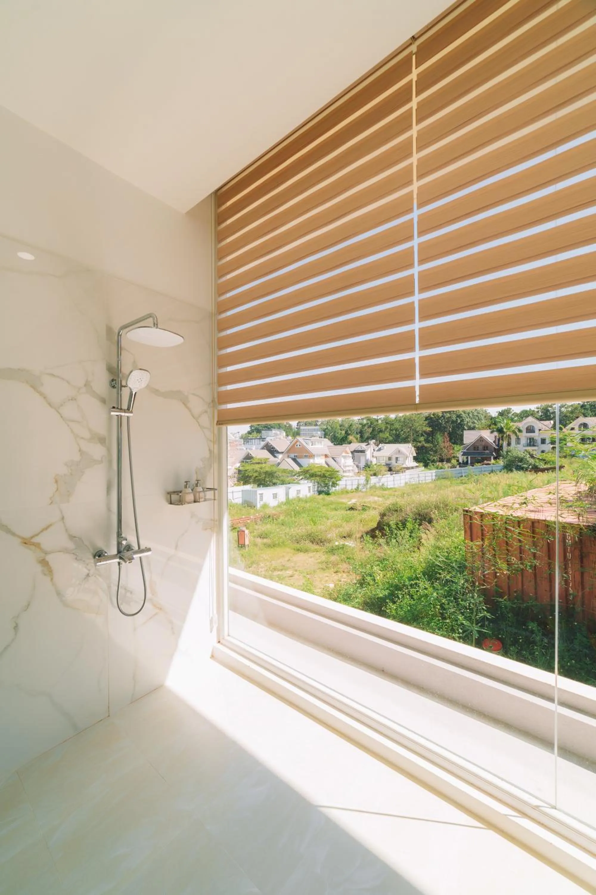 Shower in Quy Tai Premium Hotel