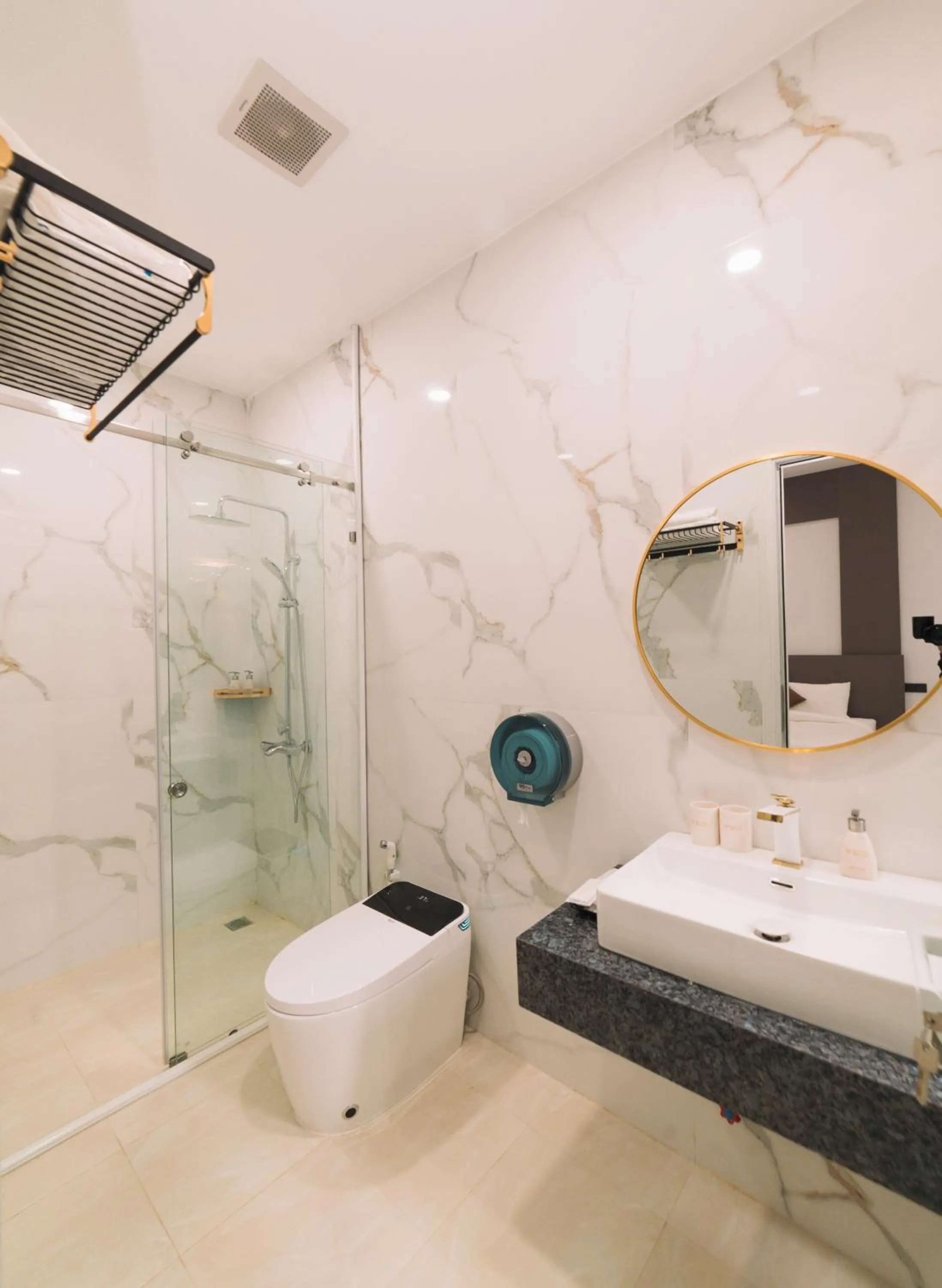 Shower in Quy Tai Premium Hotel