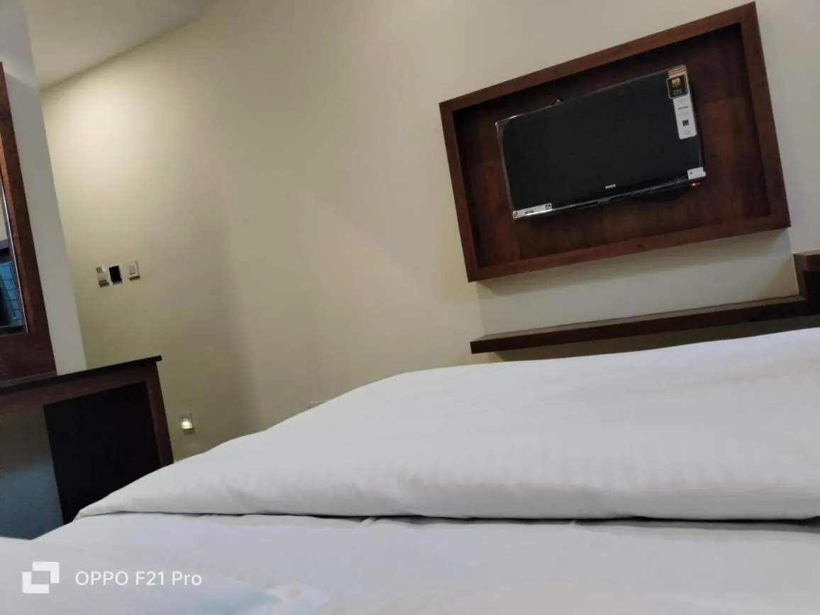 TV and multimedia, Bed in S K Legacy Hotel