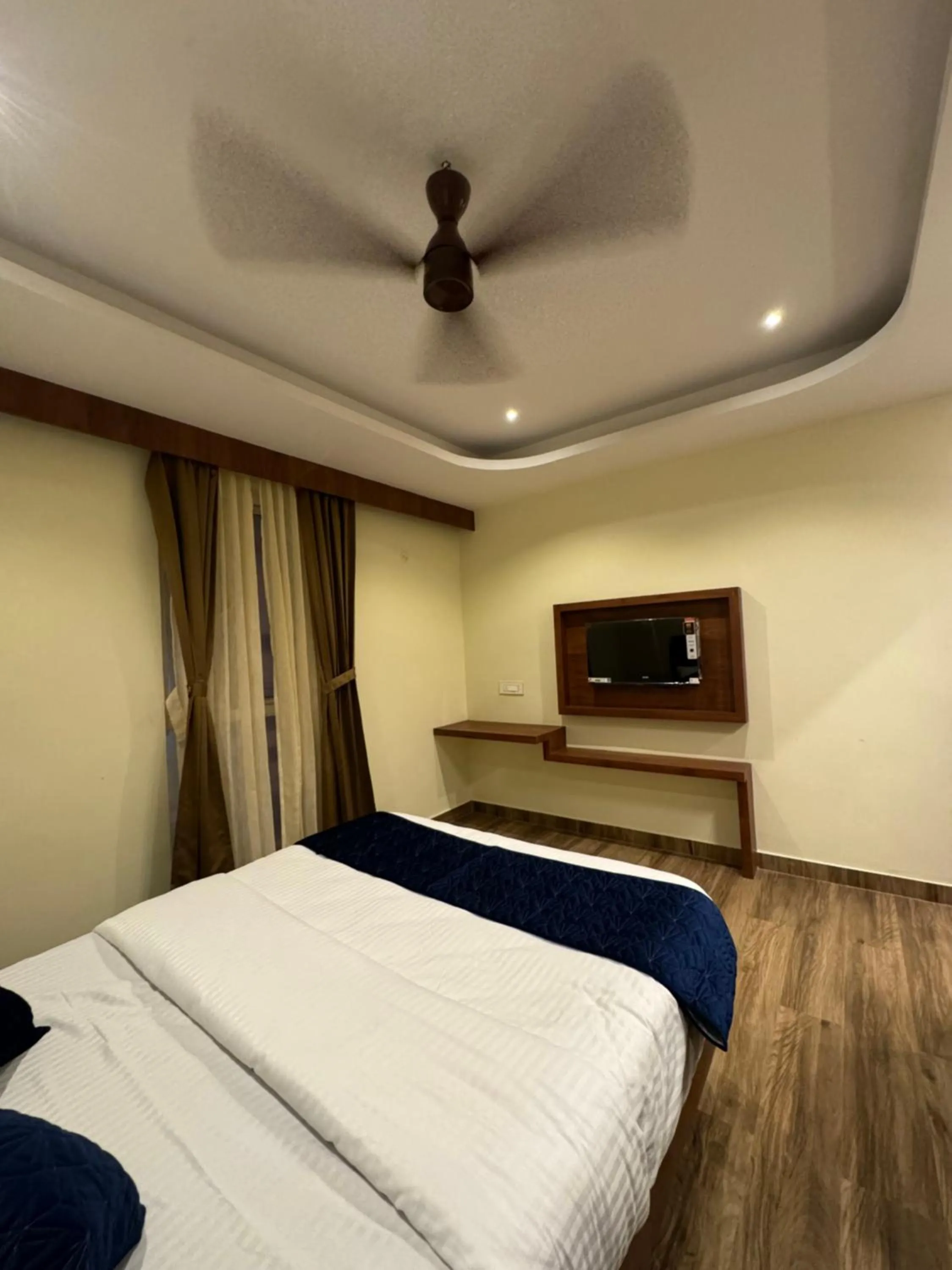 TV and multimedia, Bed in S K Legacy Hotel