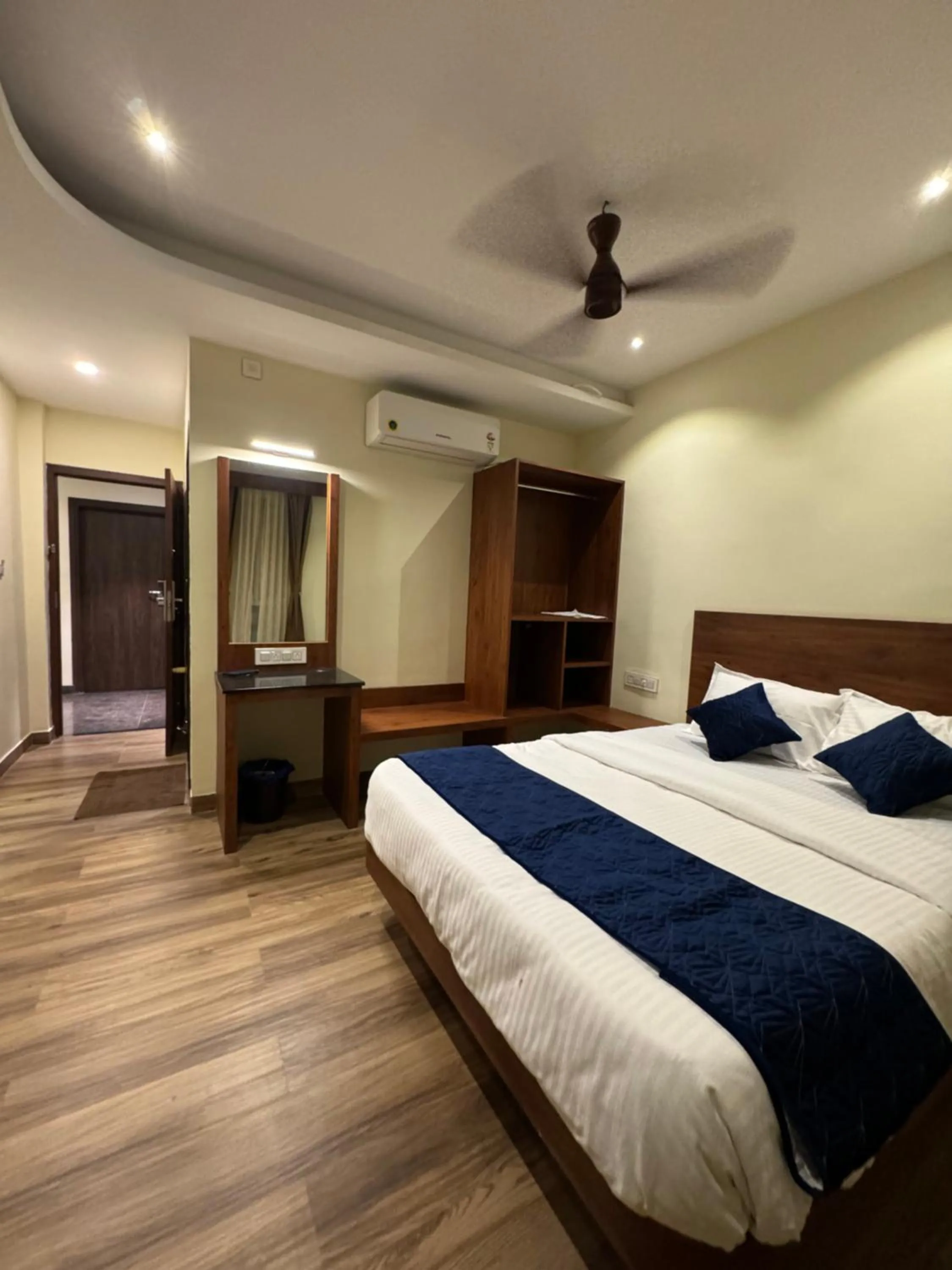 Bed in S K Legacy Hotel