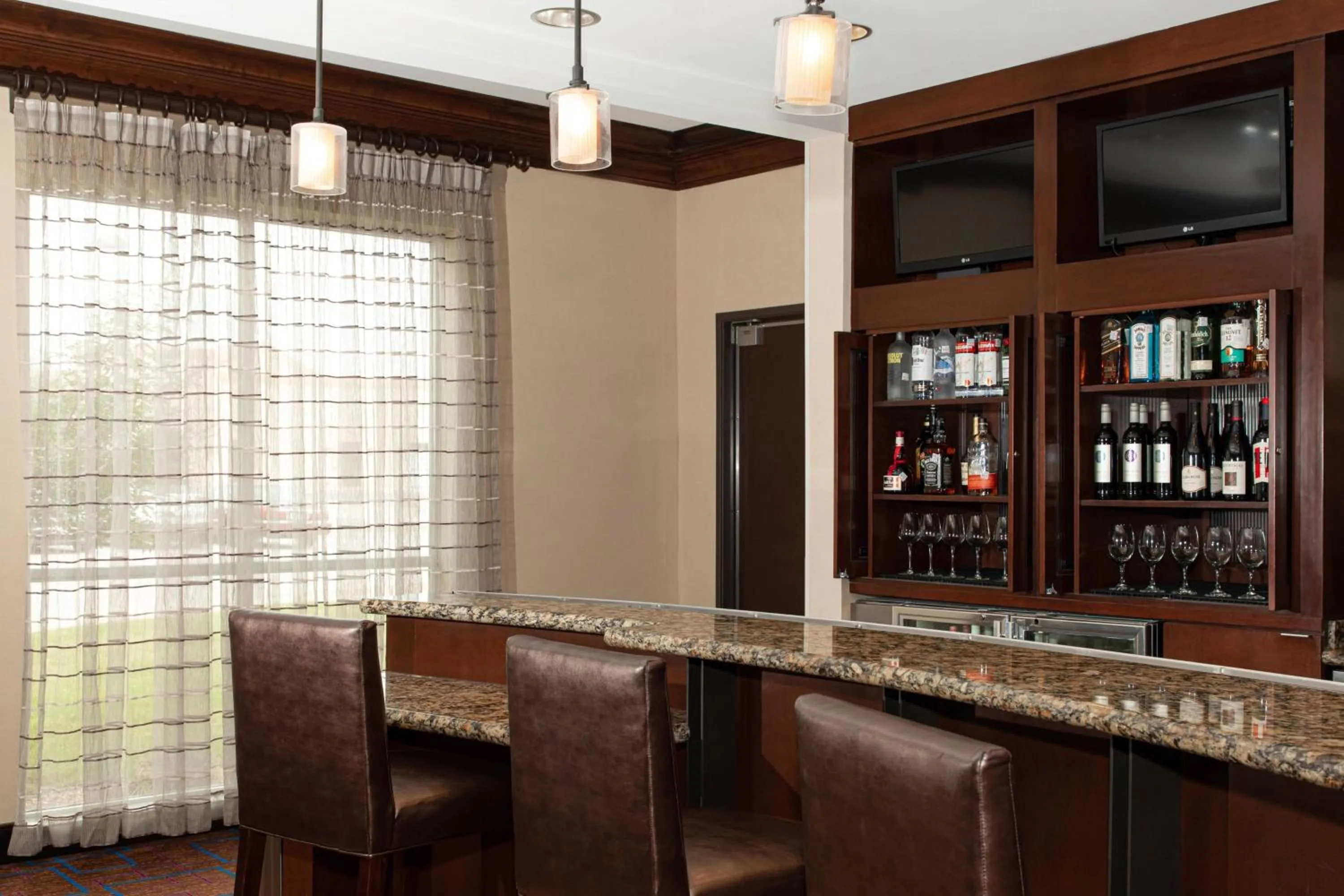 Lounge or bar in Courtyard by Marriott Odessa