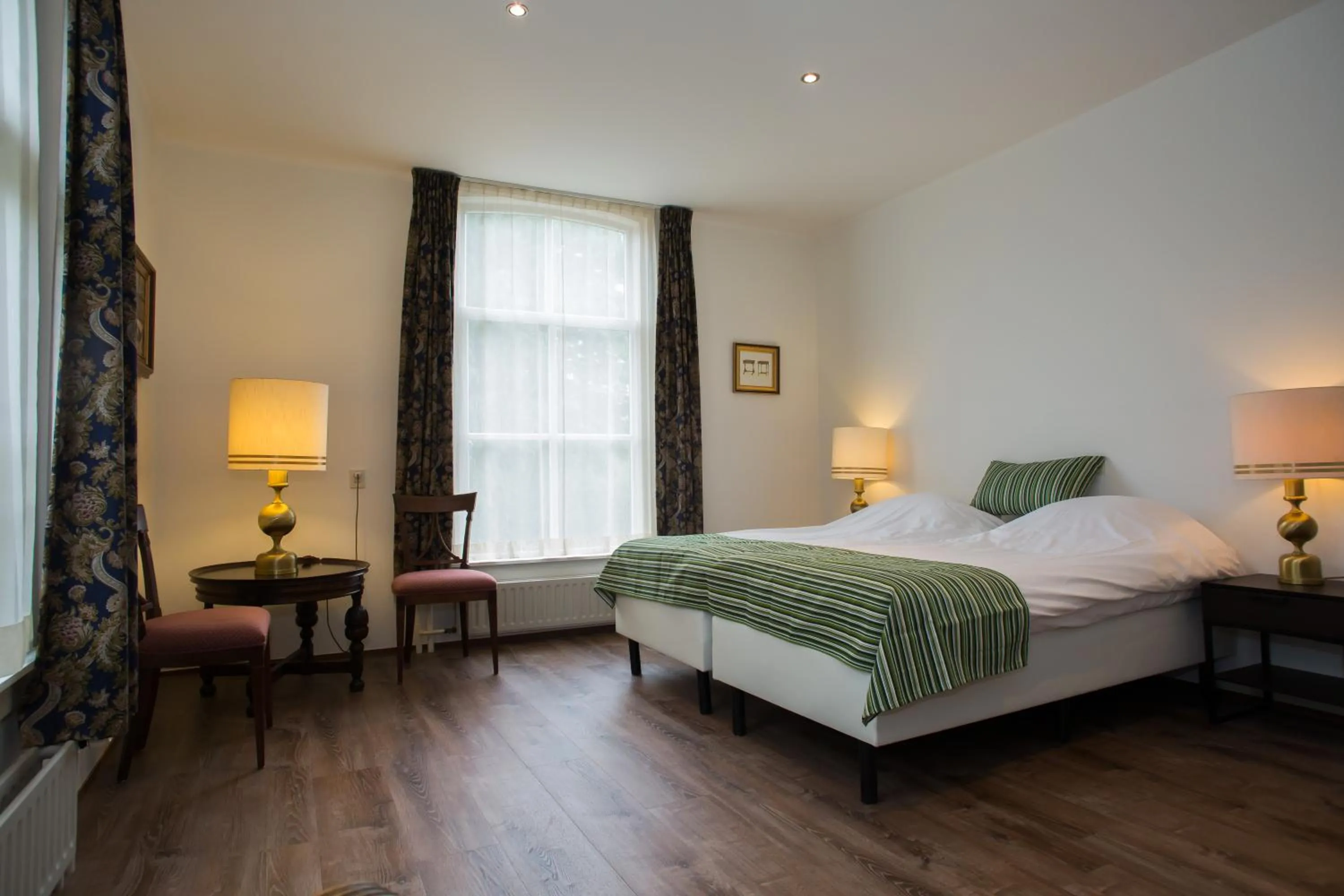 Photo of the whole room, Bed in Landhotel De Hoofdige Boer