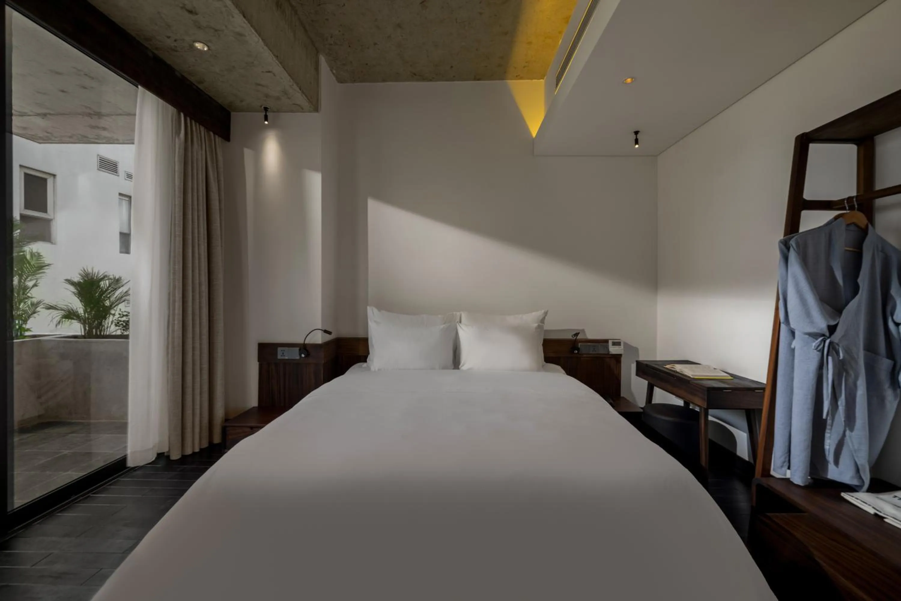 Bed in Thè HEM Hotel and Apartment