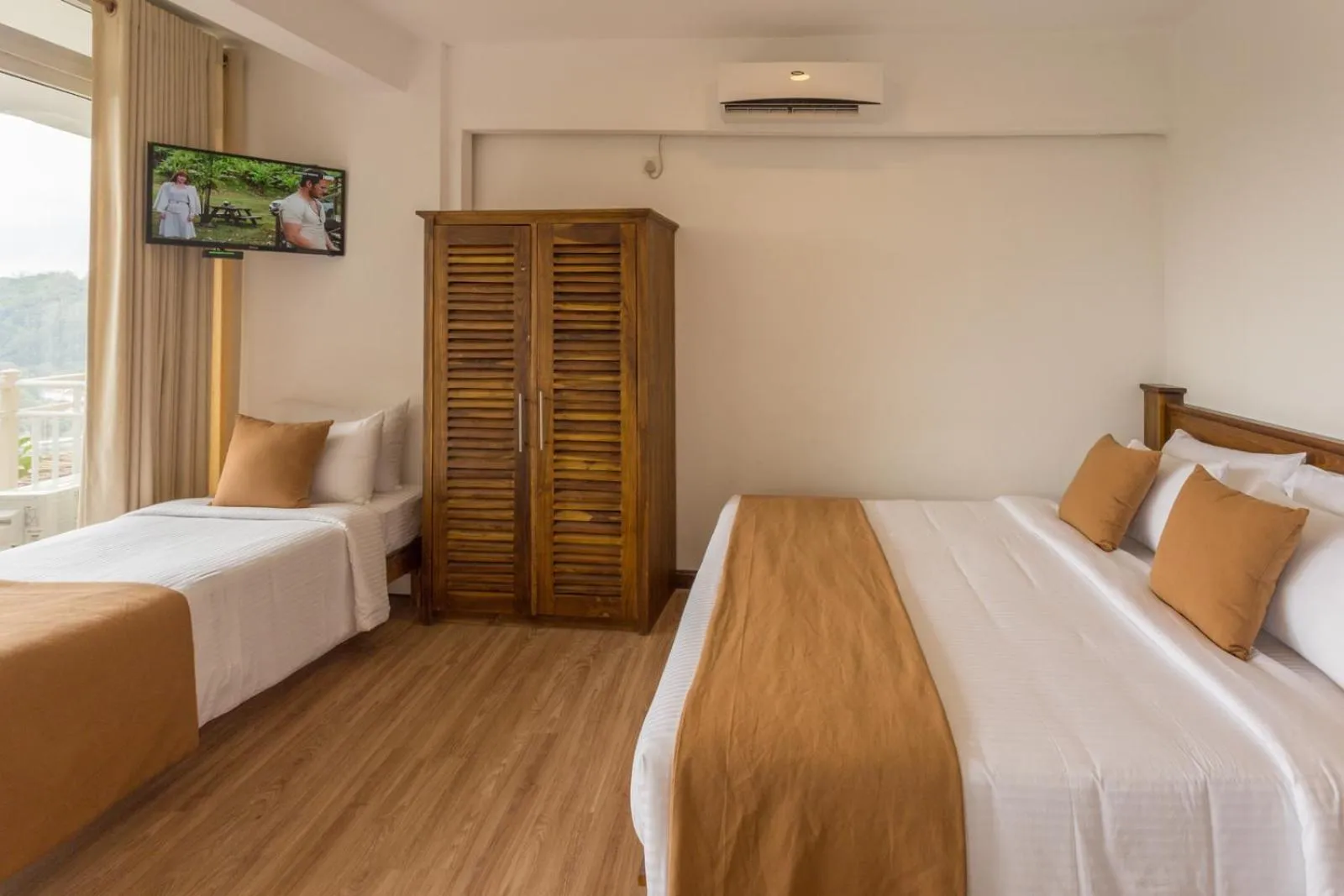 Bed in 360 Lake View Hotel