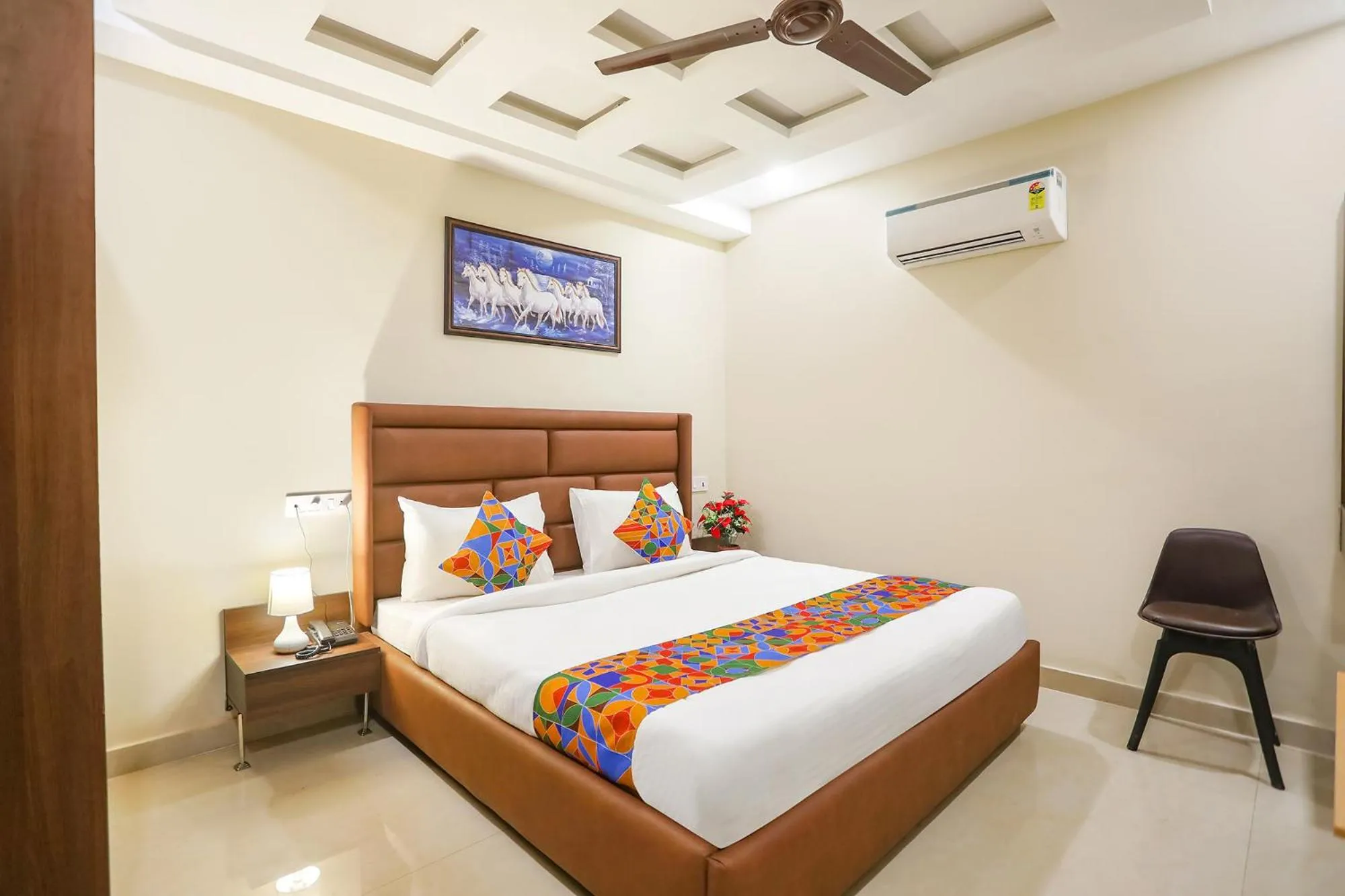 Bed in FabHotel Nirvana Residency