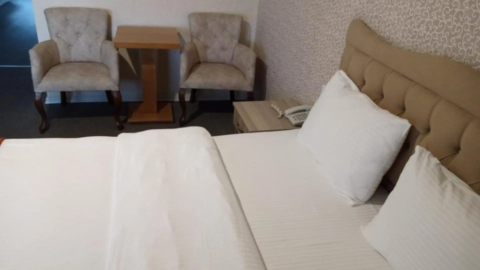 Bed in ANGRAND HOTEL