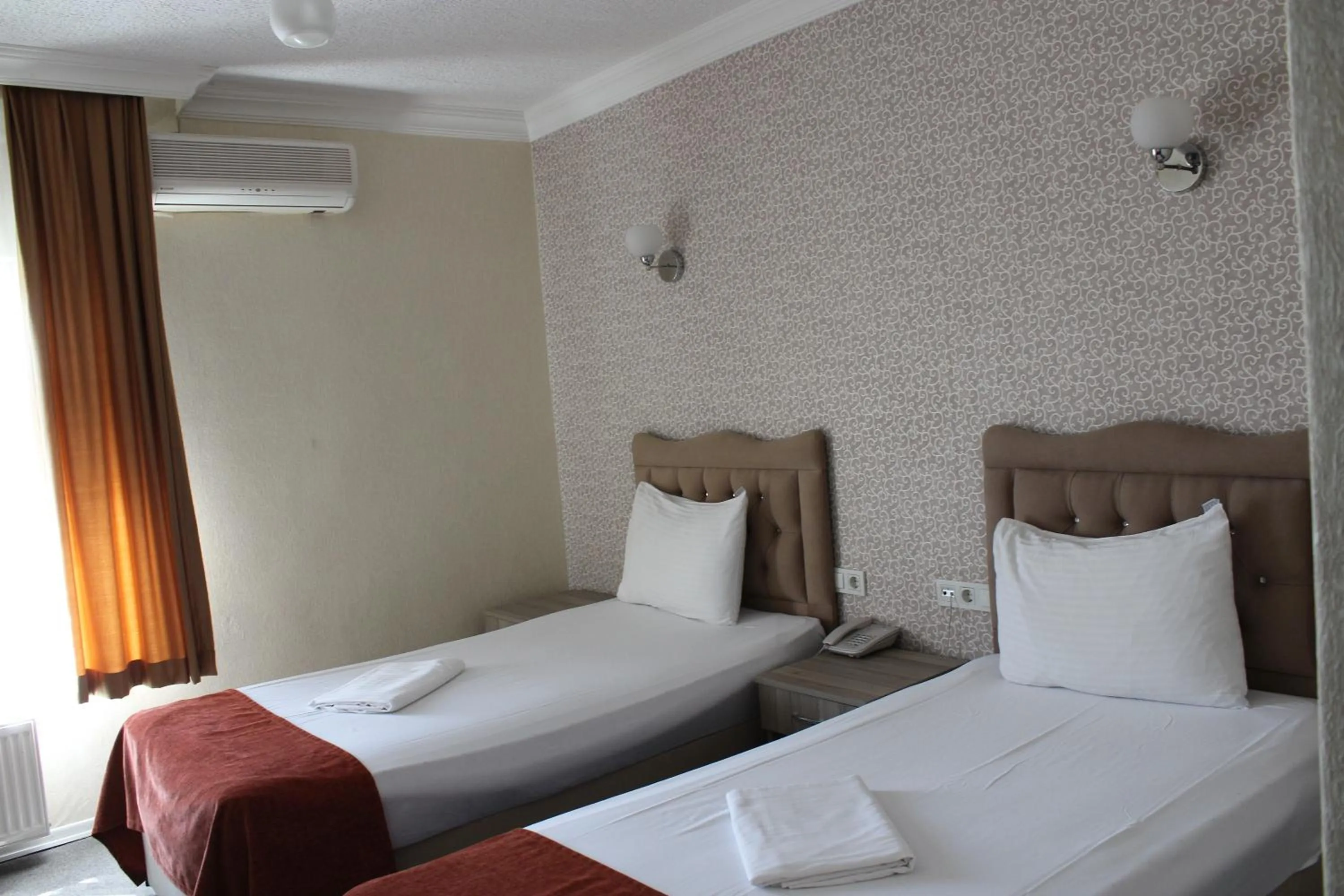 Bed in ANGRAND HOTEL