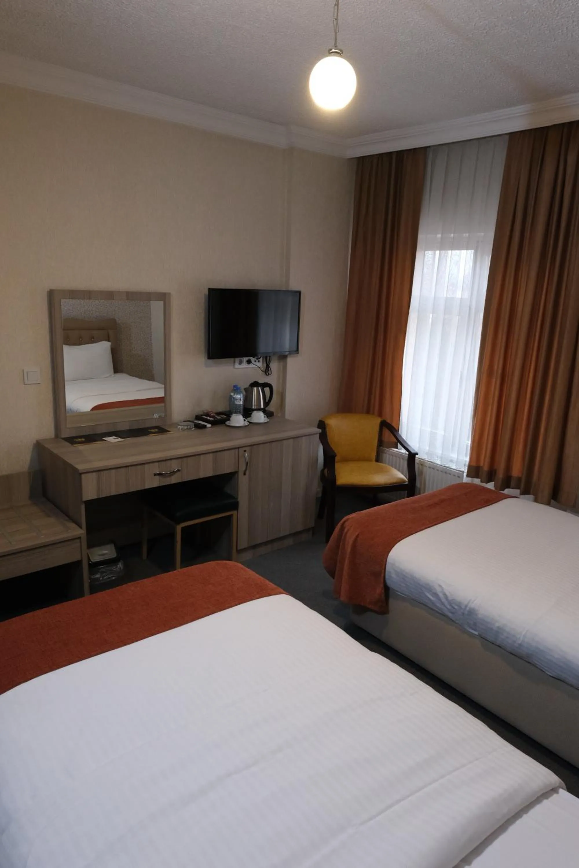 Bed in ANGRAND HOTEL