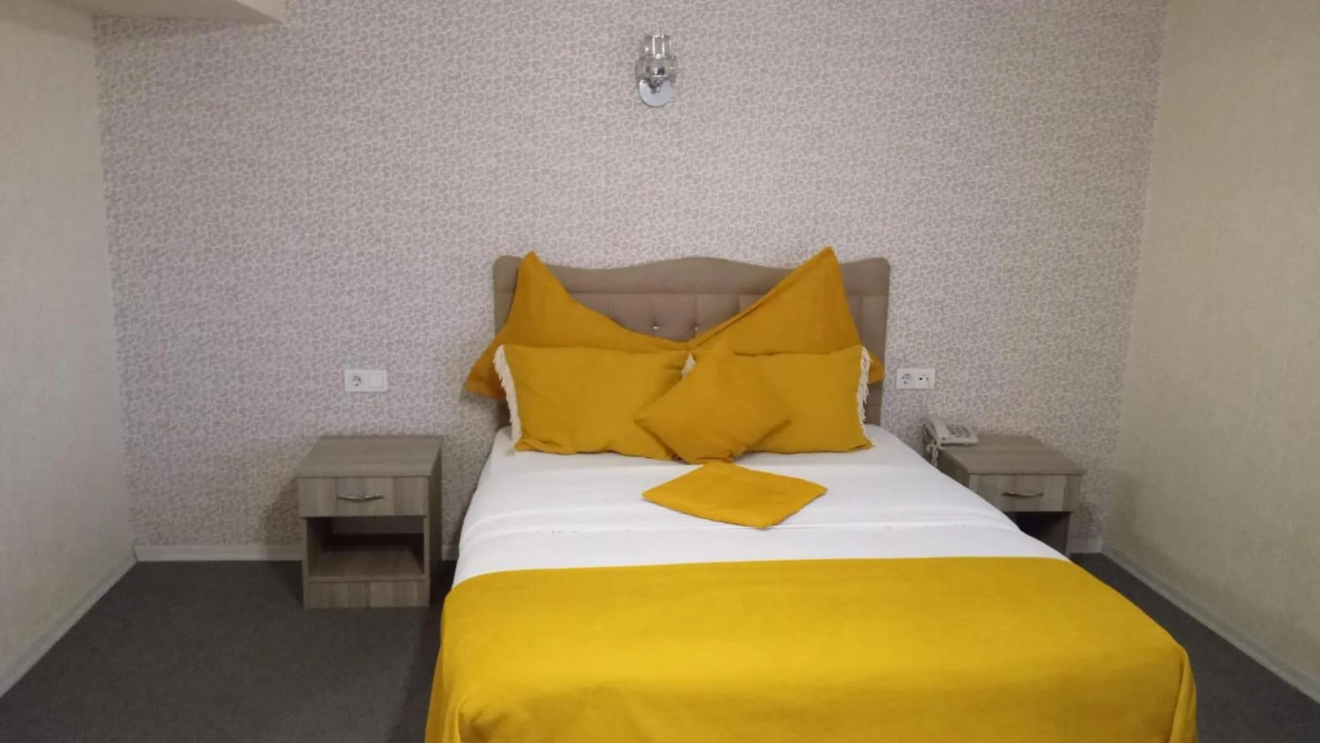 Bed in ANGRAND HOTEL