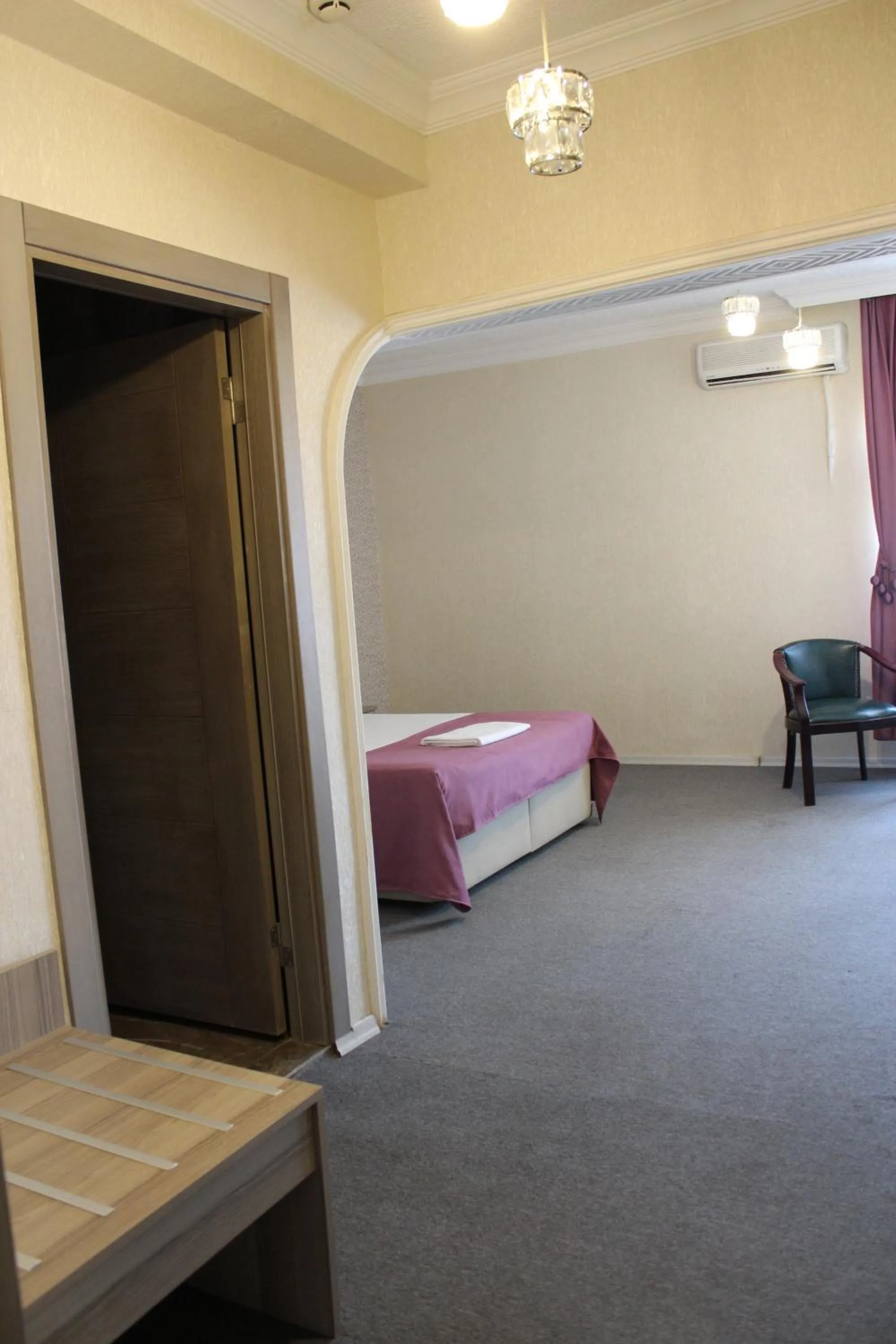 Bed in ANGRAND HOTEL