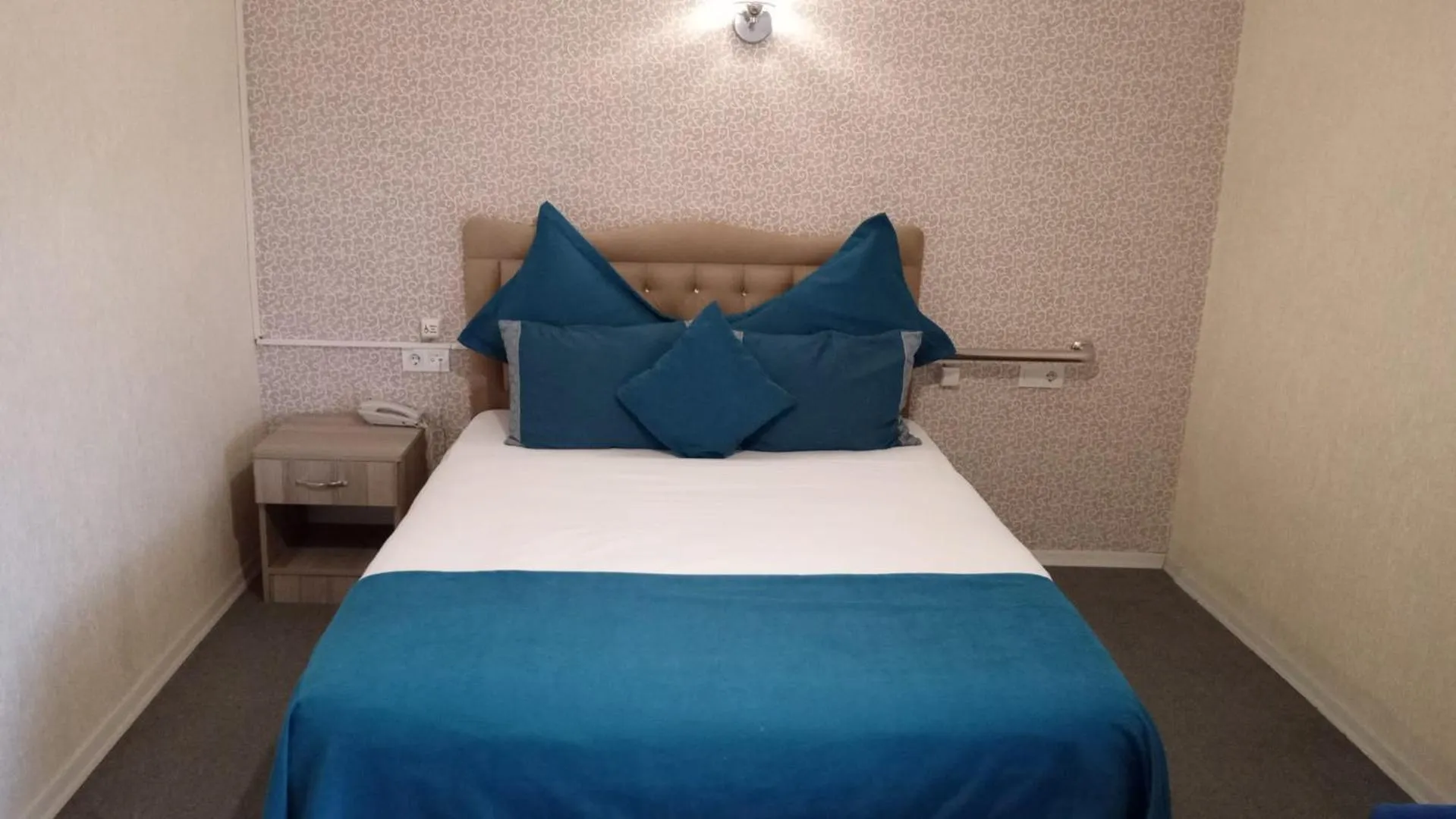 Bed in ANGRAND HOTEL