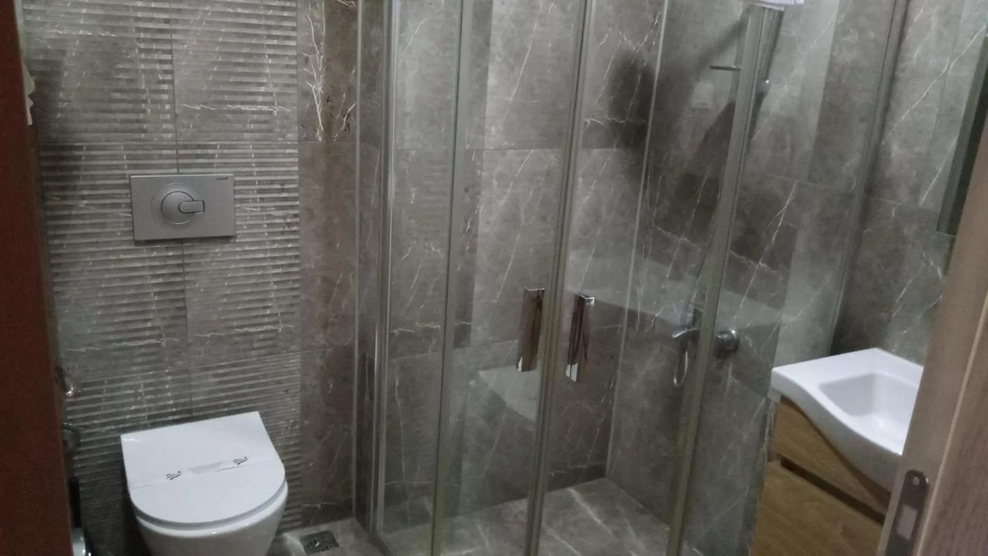 Shower in ANGRAND HOTEL