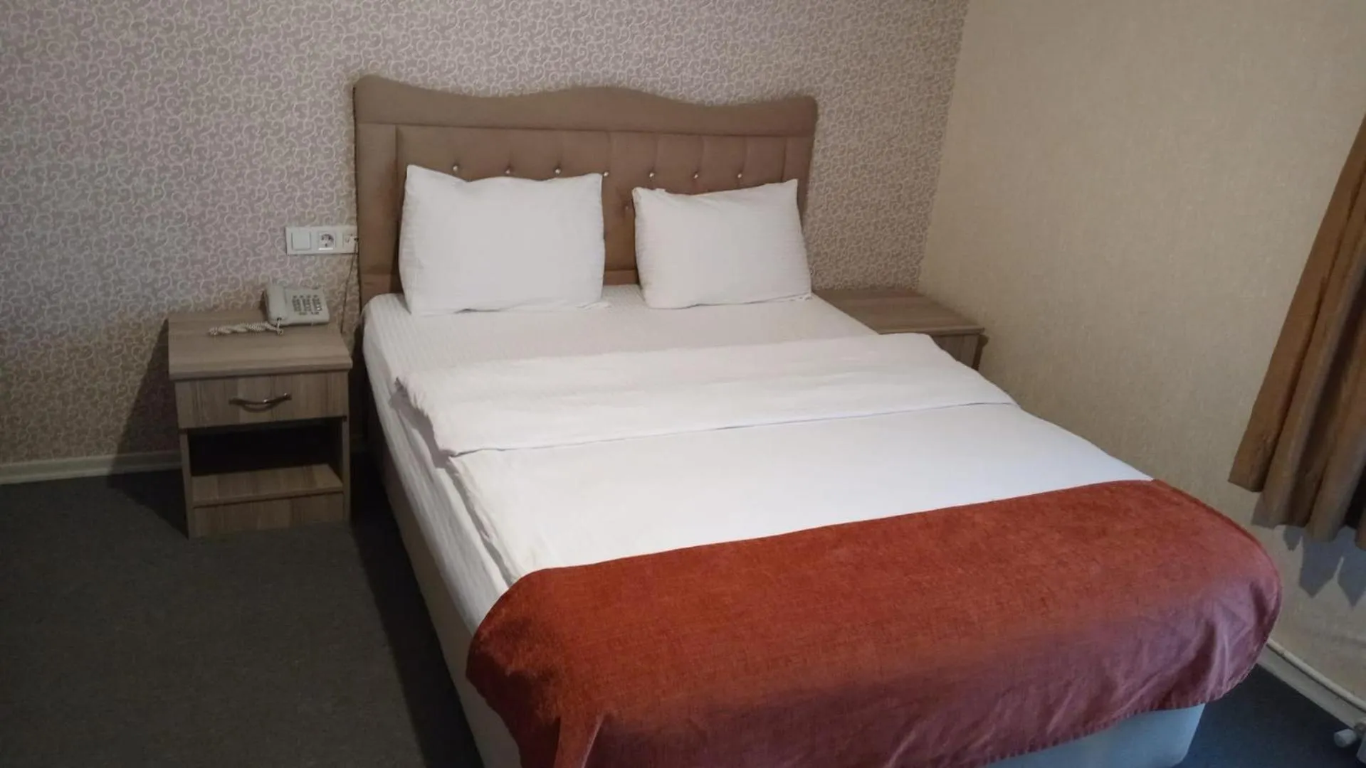 Bed in ANGRAND HOTEL