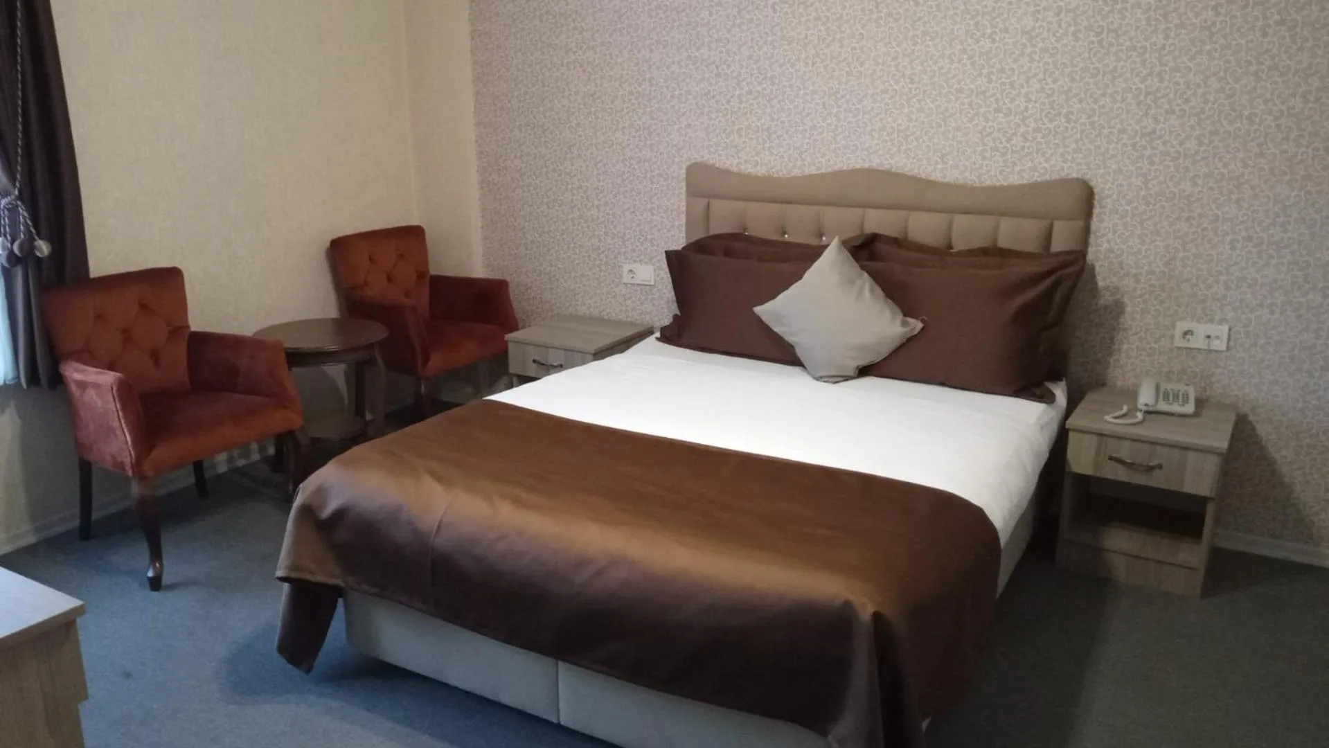 Bed in ANGRAND HOTEL