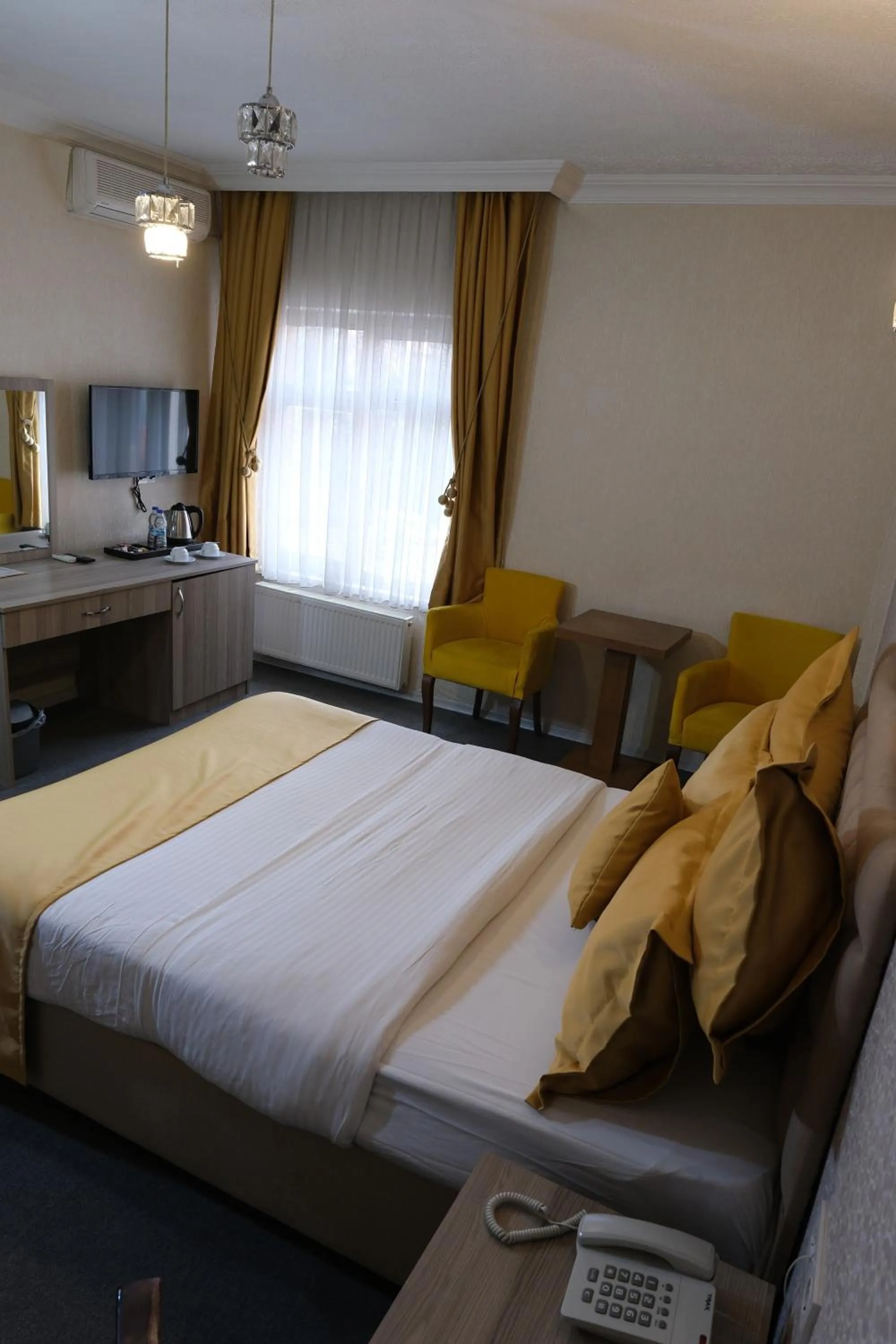 Bed in ANGRAND HOTEL