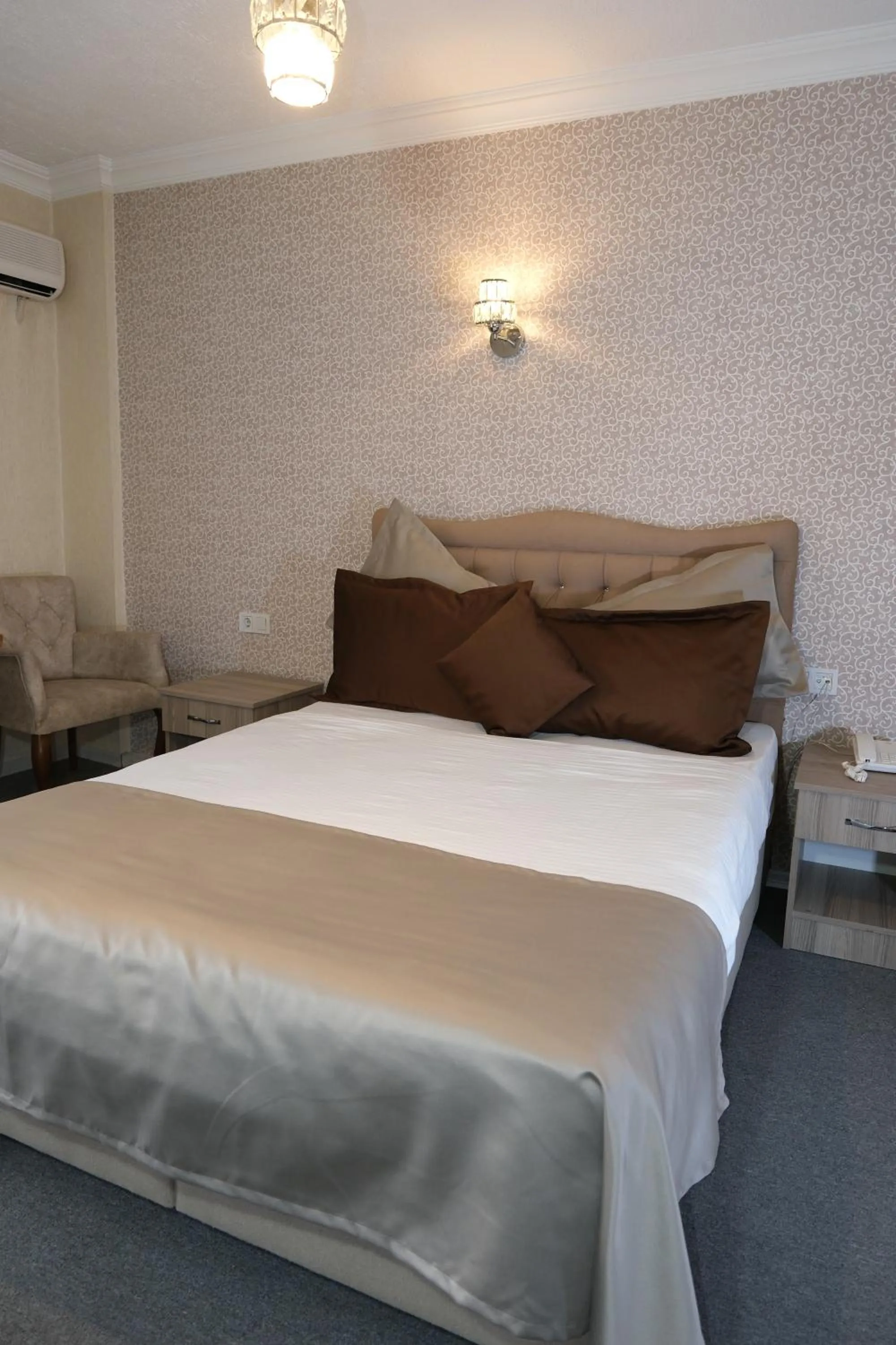 Bed in ANGRAND HOTEL