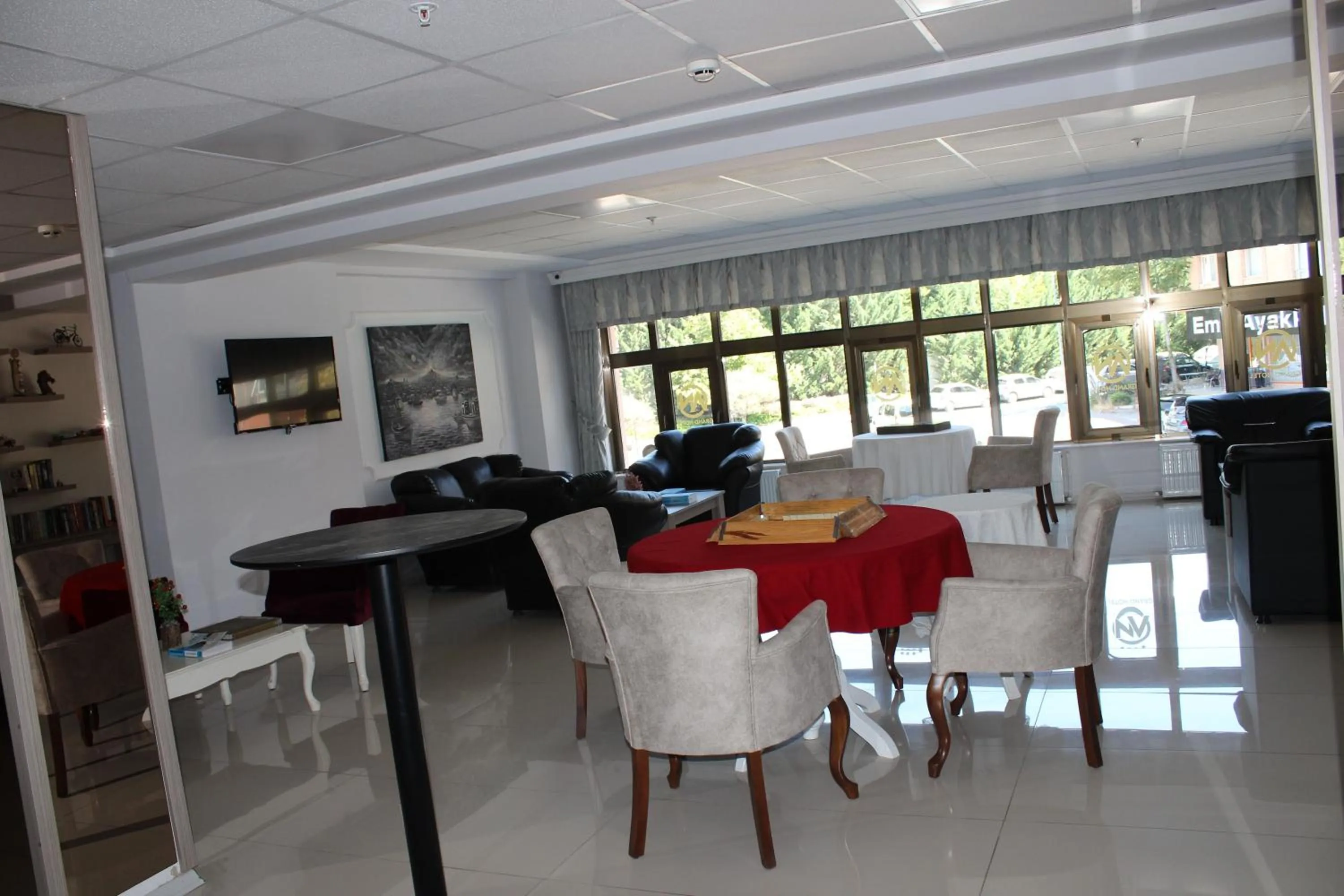 Communal lounge/ TV room in ANGRAND HOTEL