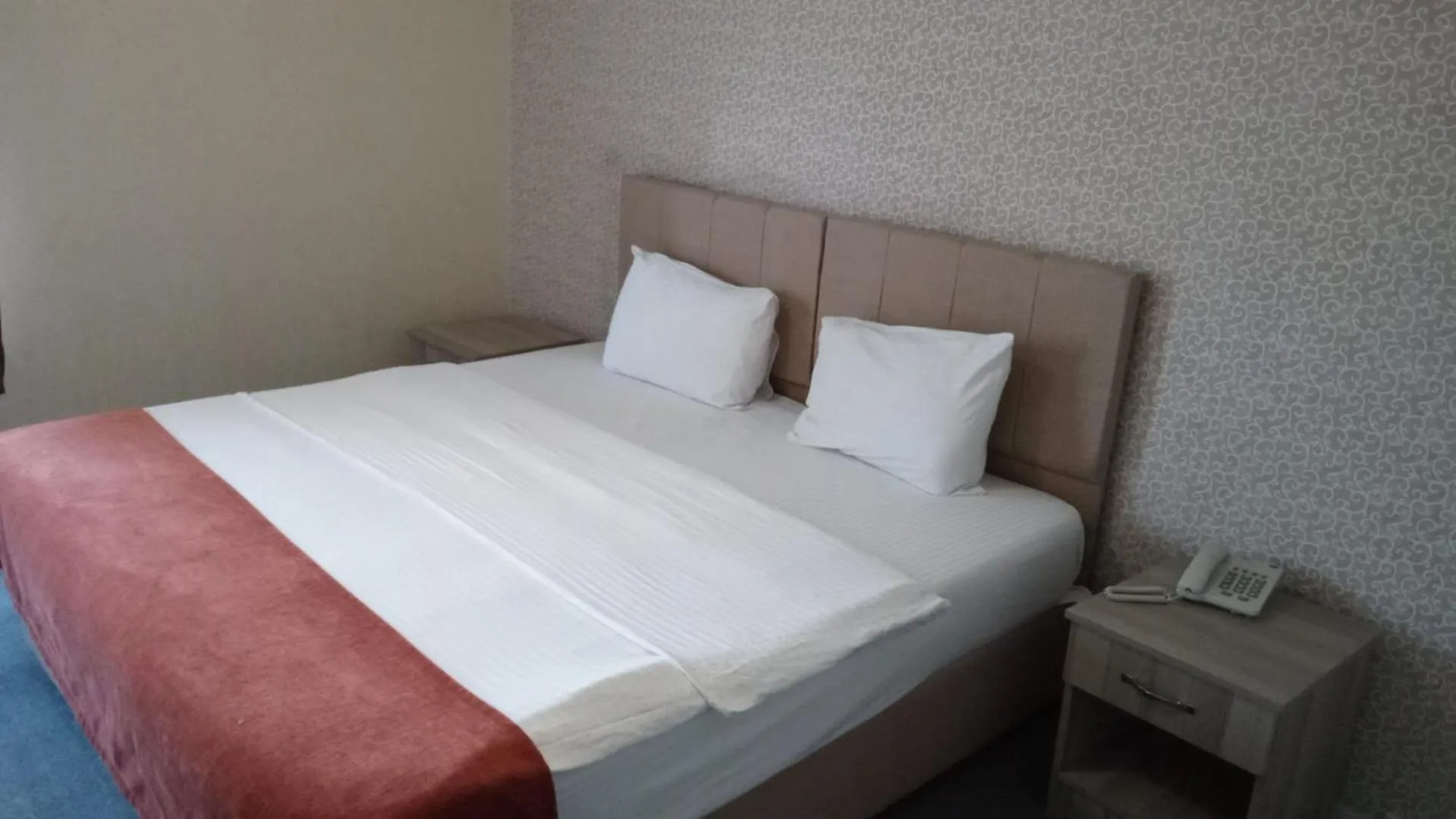 Bed in ANGRAND HOTEL