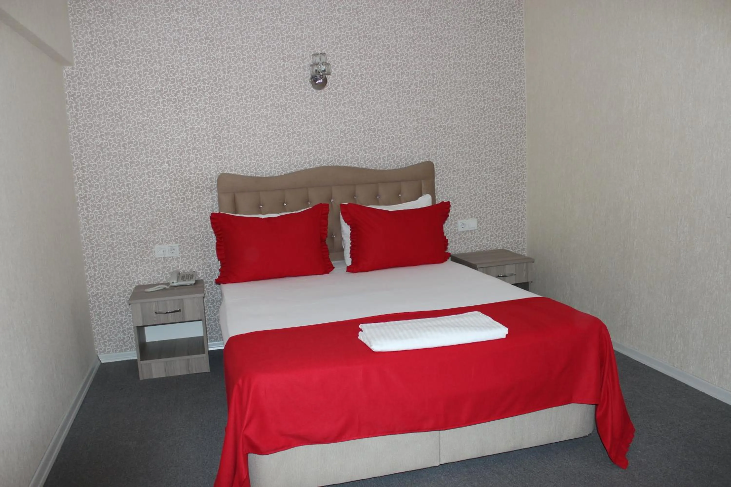 Bed in ANGRAND HOTEL