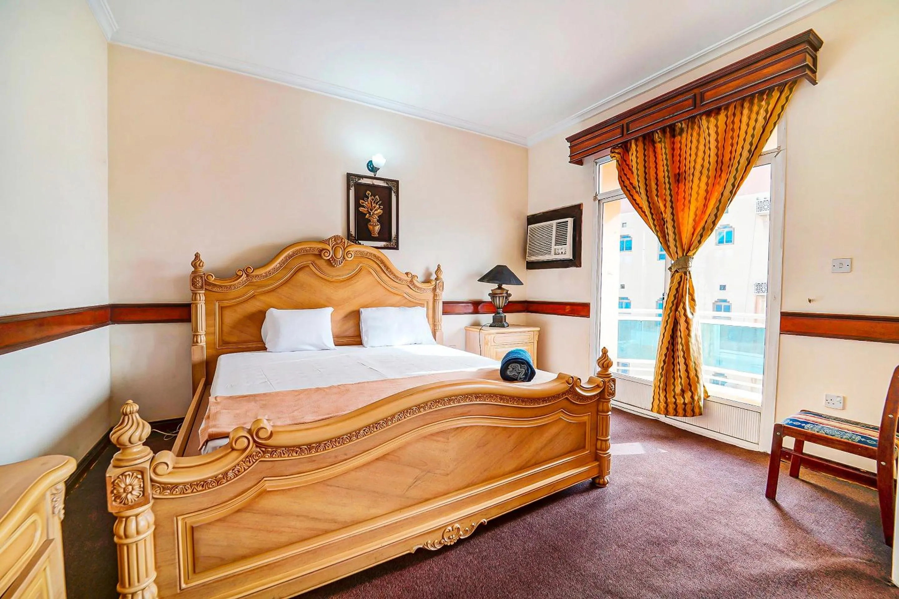 Bedroom, Bed in OYO 120 Concord International Hotel