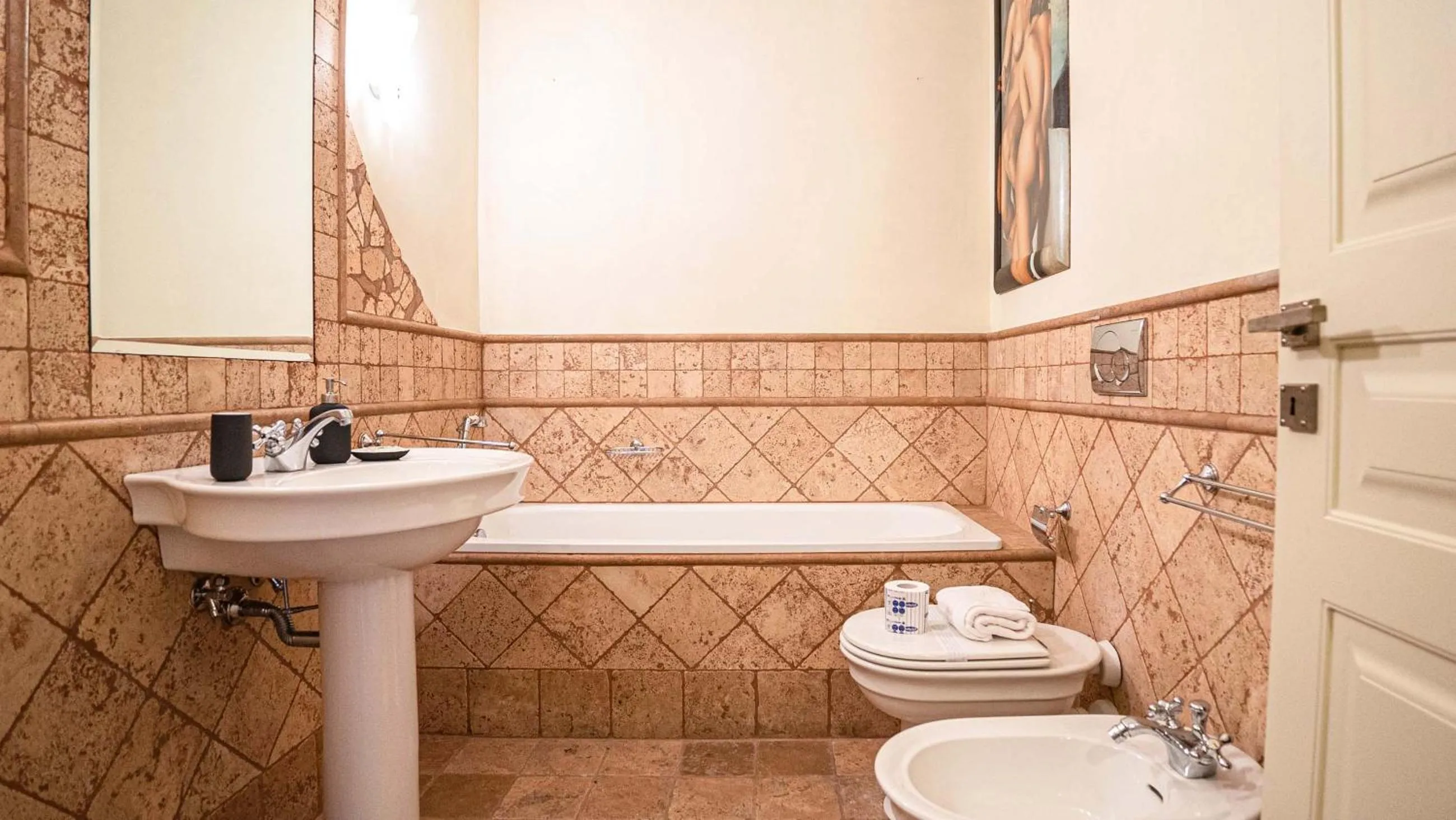 Bathroom in EasyTopStay - Piazza Venezia City View Charming Apt