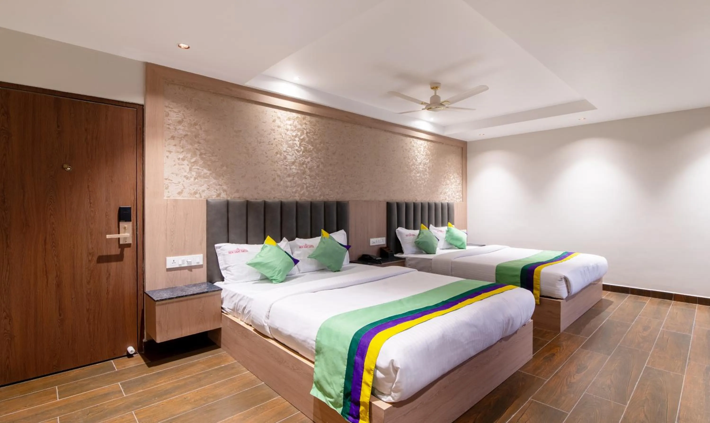 Bedroom, Bed in Treebo Premium New Light Suites