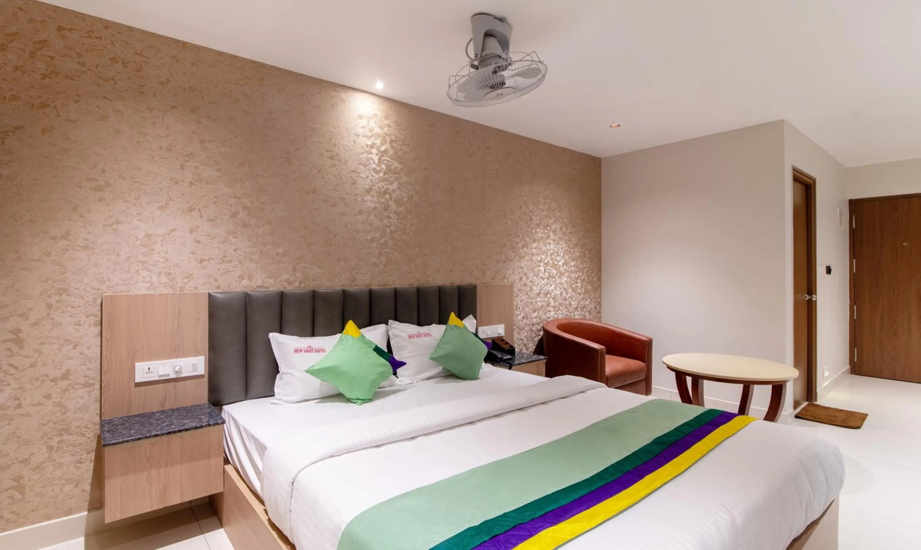 Bedroom, Bed in Treebo Premium New Light Suites