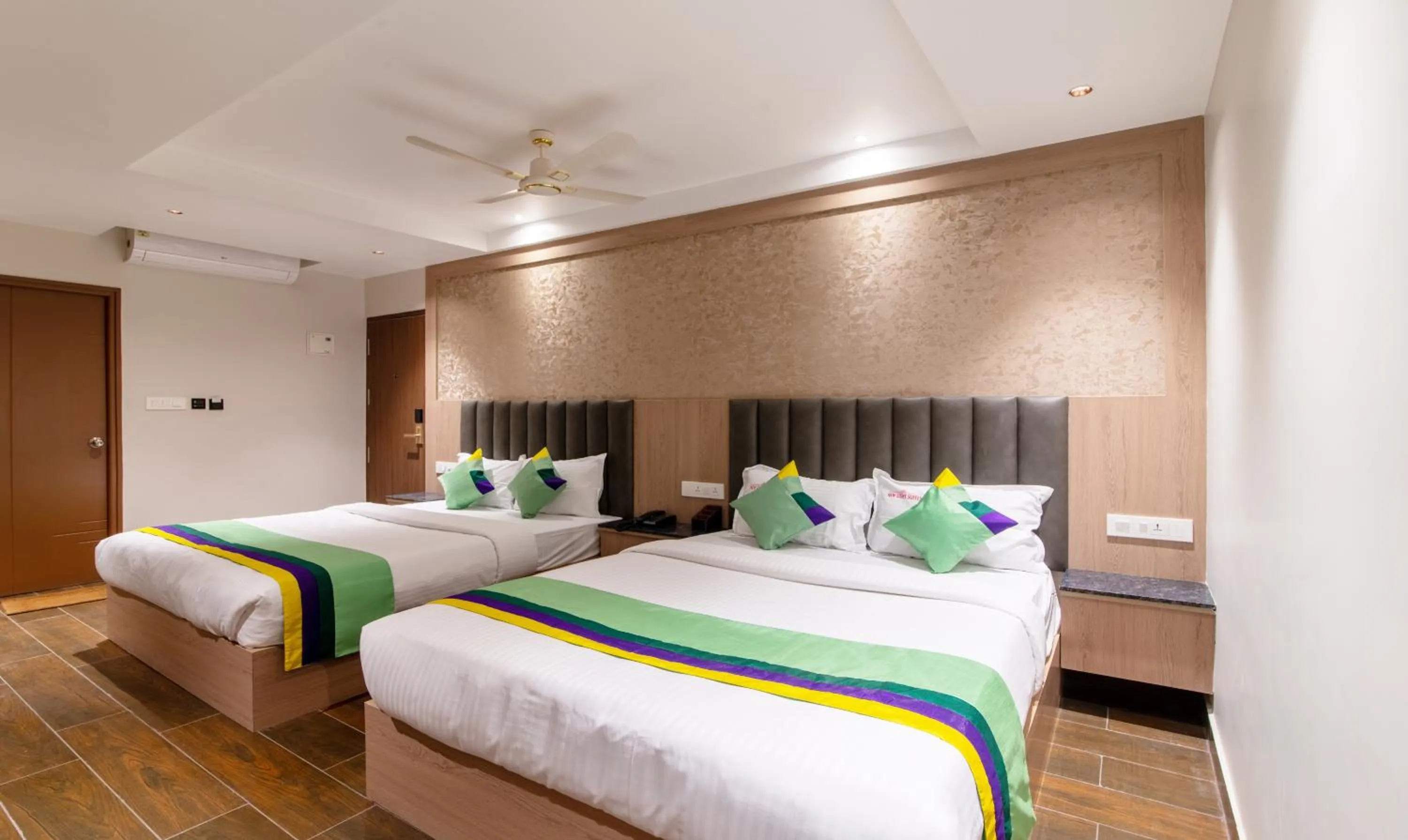 Bedroom, Bed in Treebo Premium New Light Suites