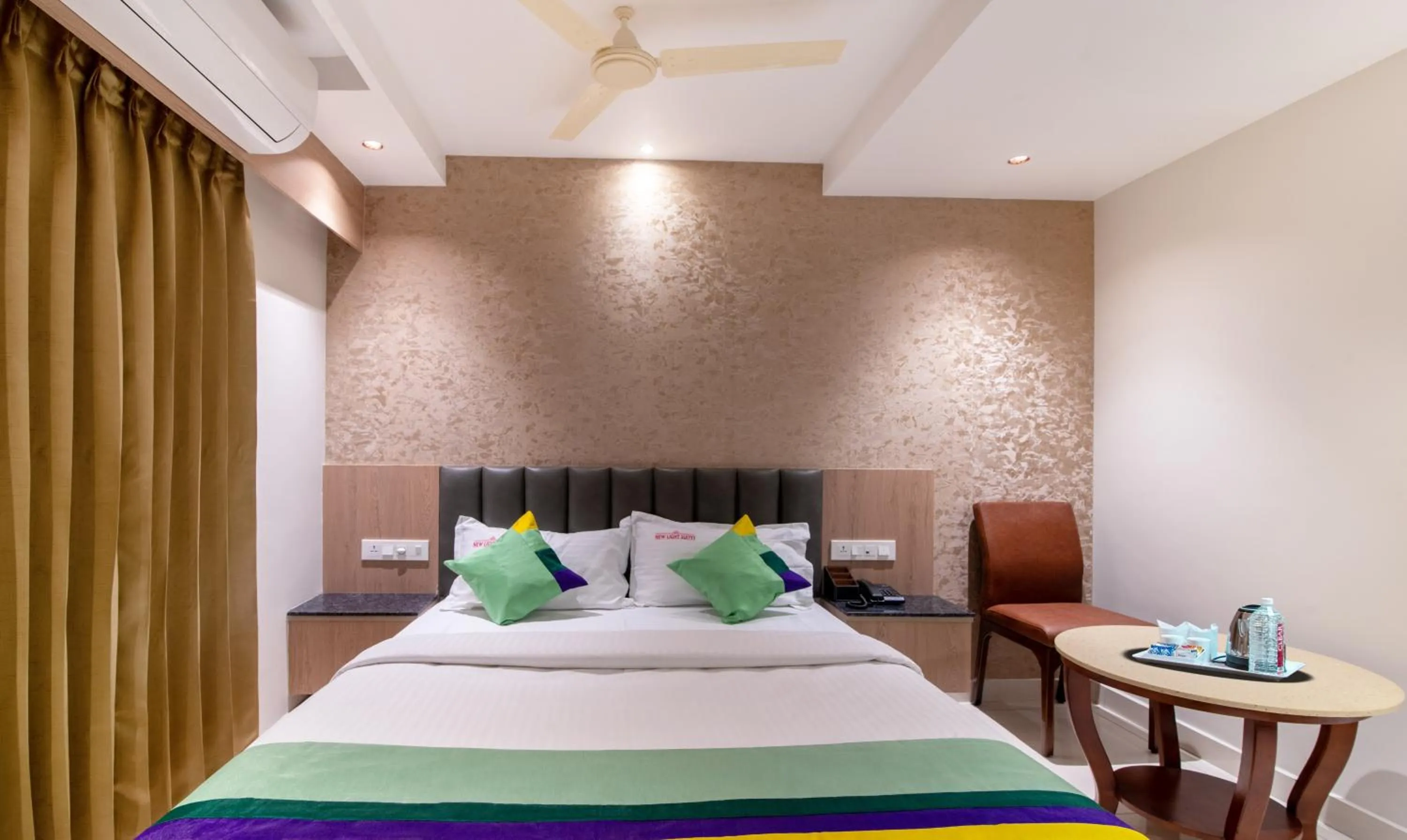 Bedroom, Bed in Treebo Premium New Light Suites