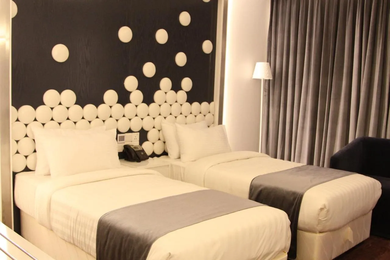 Bed in Grace 21 Smart Hotel