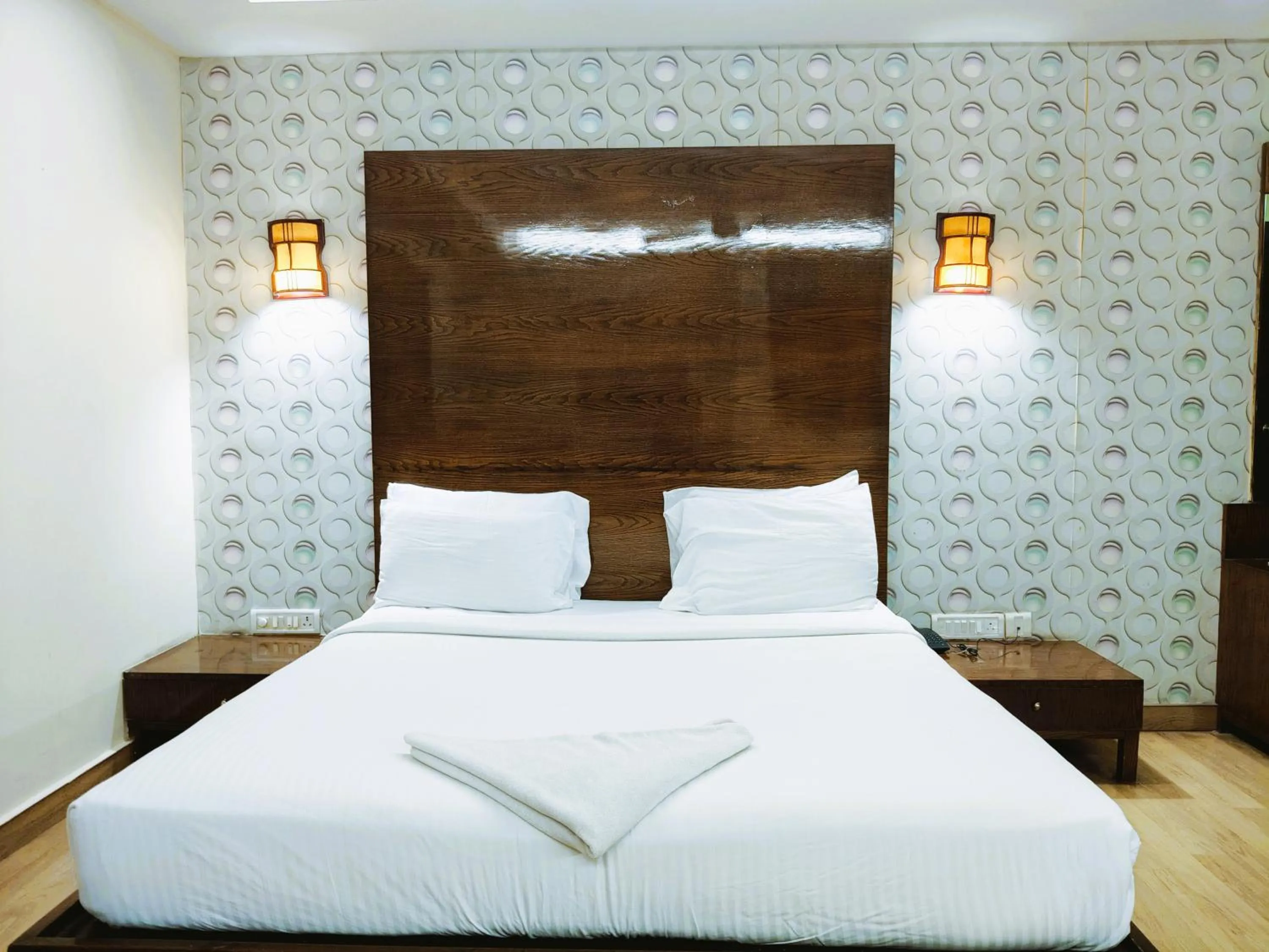 Bed in Athasri Hotel Infantry Road