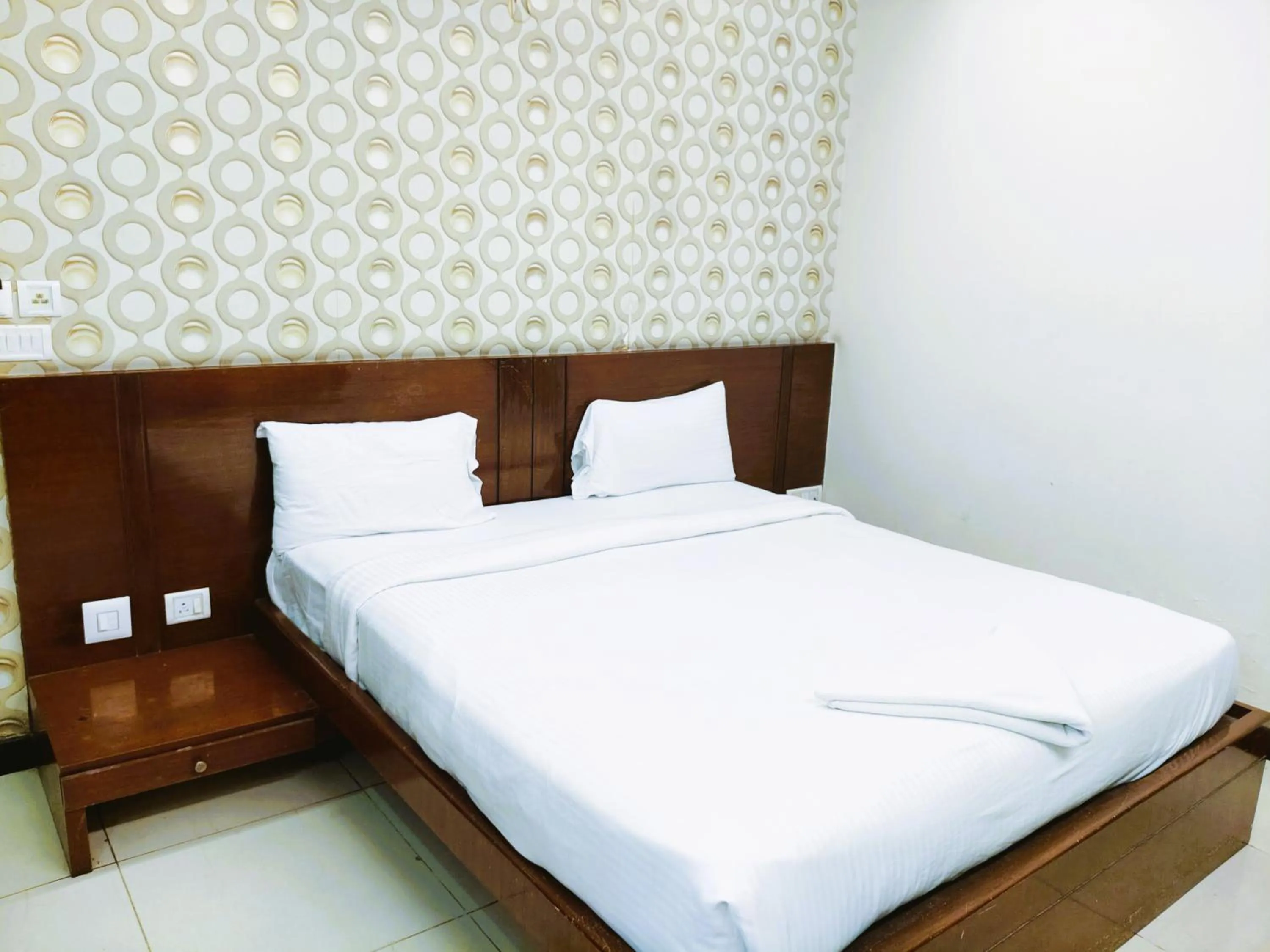 Bed in Athasri Hotel Infantry Road