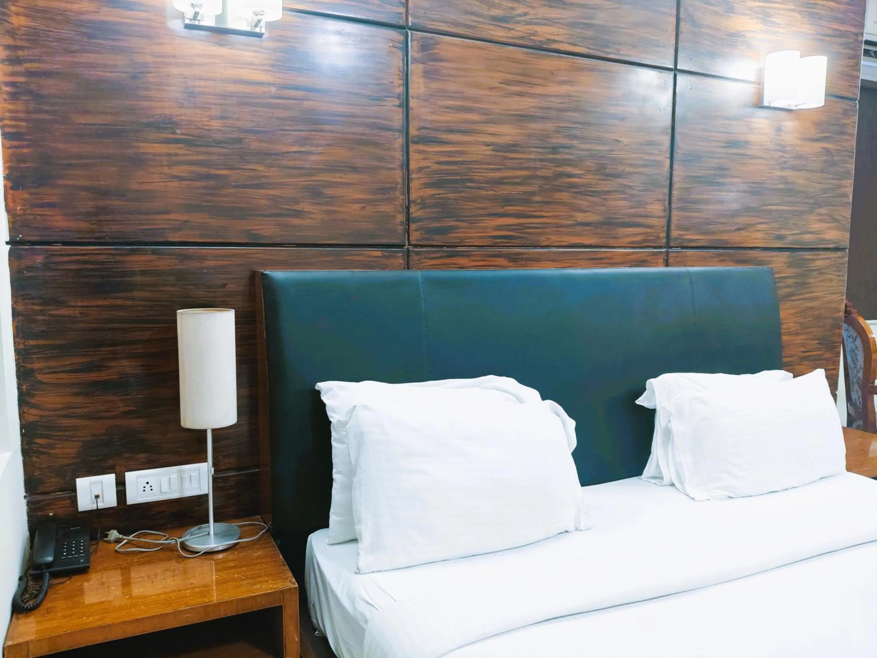 Bed in Athasri Hotel Infantry Road